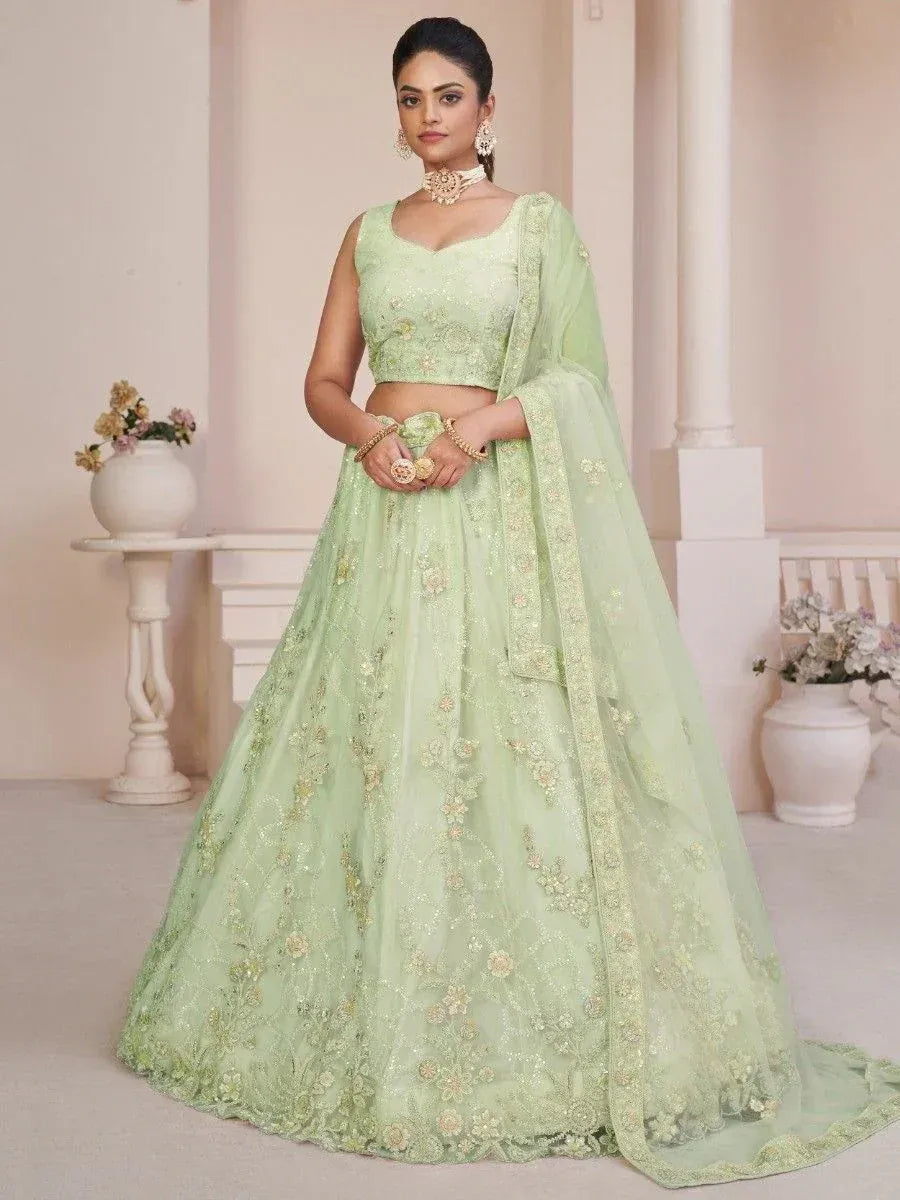 Mint green embroidered lehenga choli with floral detailing, perfect for Indian ethnic occasions