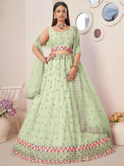 Magnetic Green Sequins Net Festival Wear Lehenga Choli With Dupatta