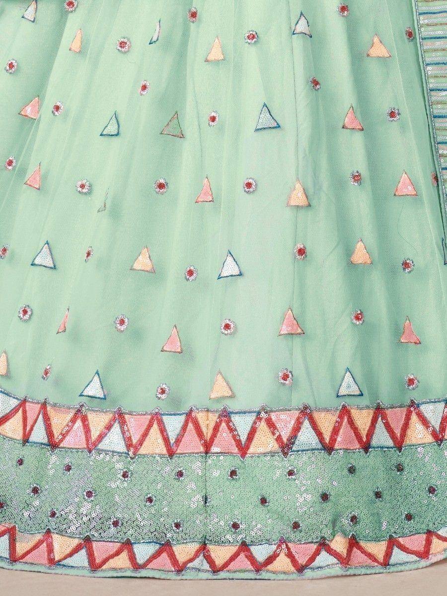 Mint green lehenga with colorful triangle and floral embroidery, sequin border detailing