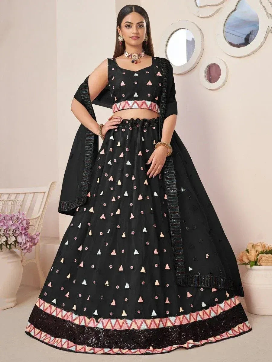 Black lehenga choli with pink and white geometric embroidery, perfect for Indian ethnic wear occasions