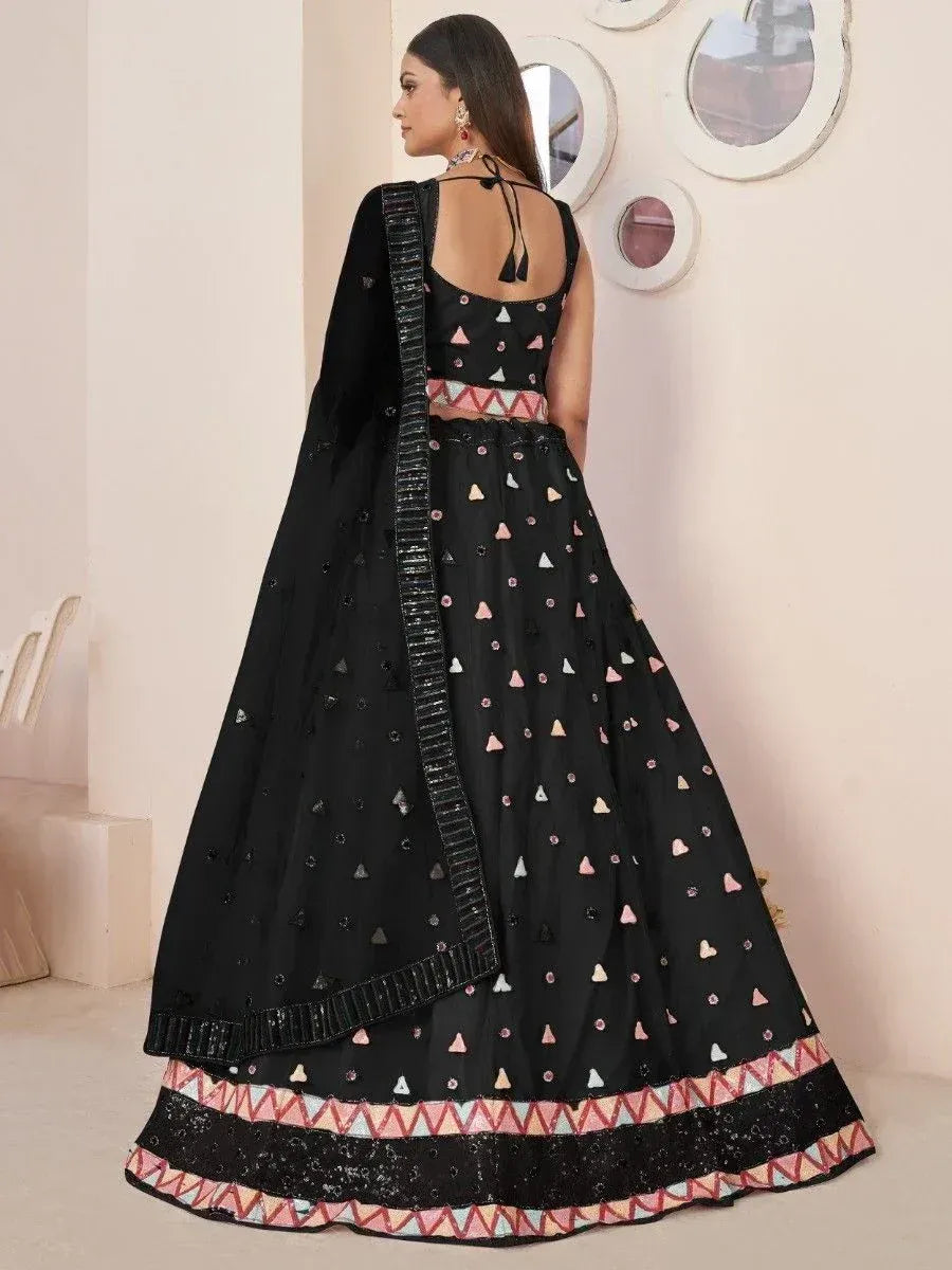 Black lehenga choli with geometric embroidery and colorful border, perfect for Indian ethnic wear occasions
