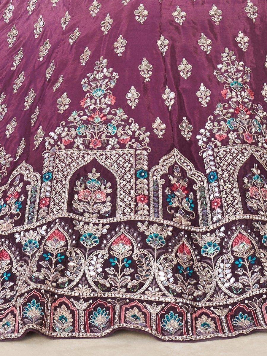 Purple lehenga with intricate floral embroidery and mirror work, perfect for Indian ethnic wear
