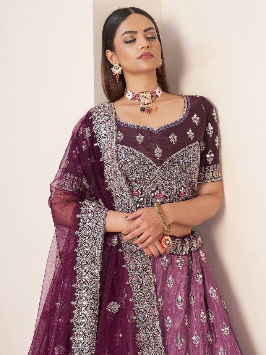 Elegant purple designer lehenga choli with intricate embroidery and embellished dupatta for Indian ethnic wear