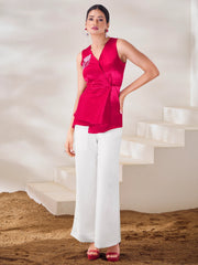 Woman in red sleeveless top and white palazzo pants, ethnic wear from Ethnic Plus