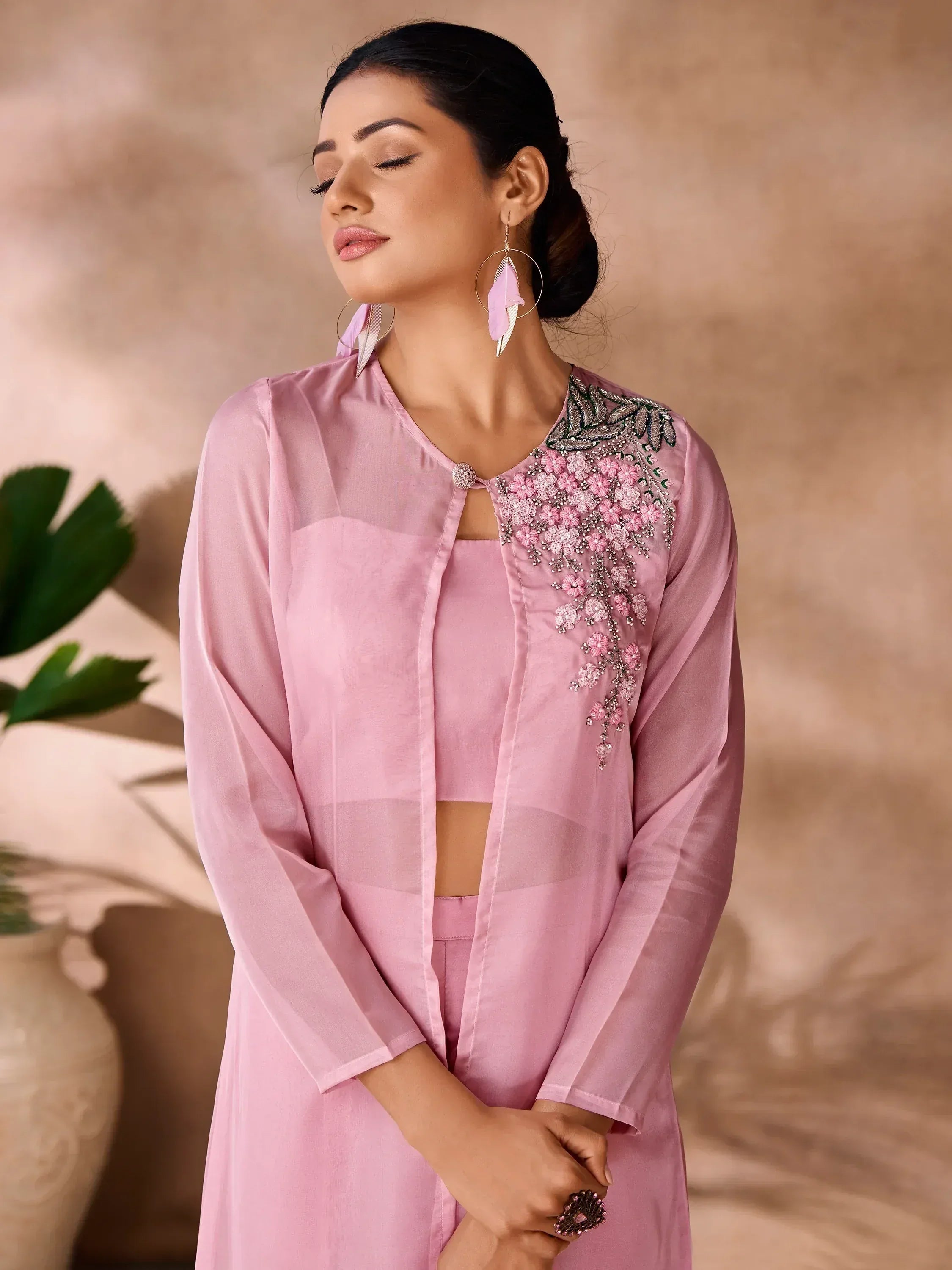 Pink embroidered ethnic kurta set with floral detailing, perfect for Indian occasions and festive wear