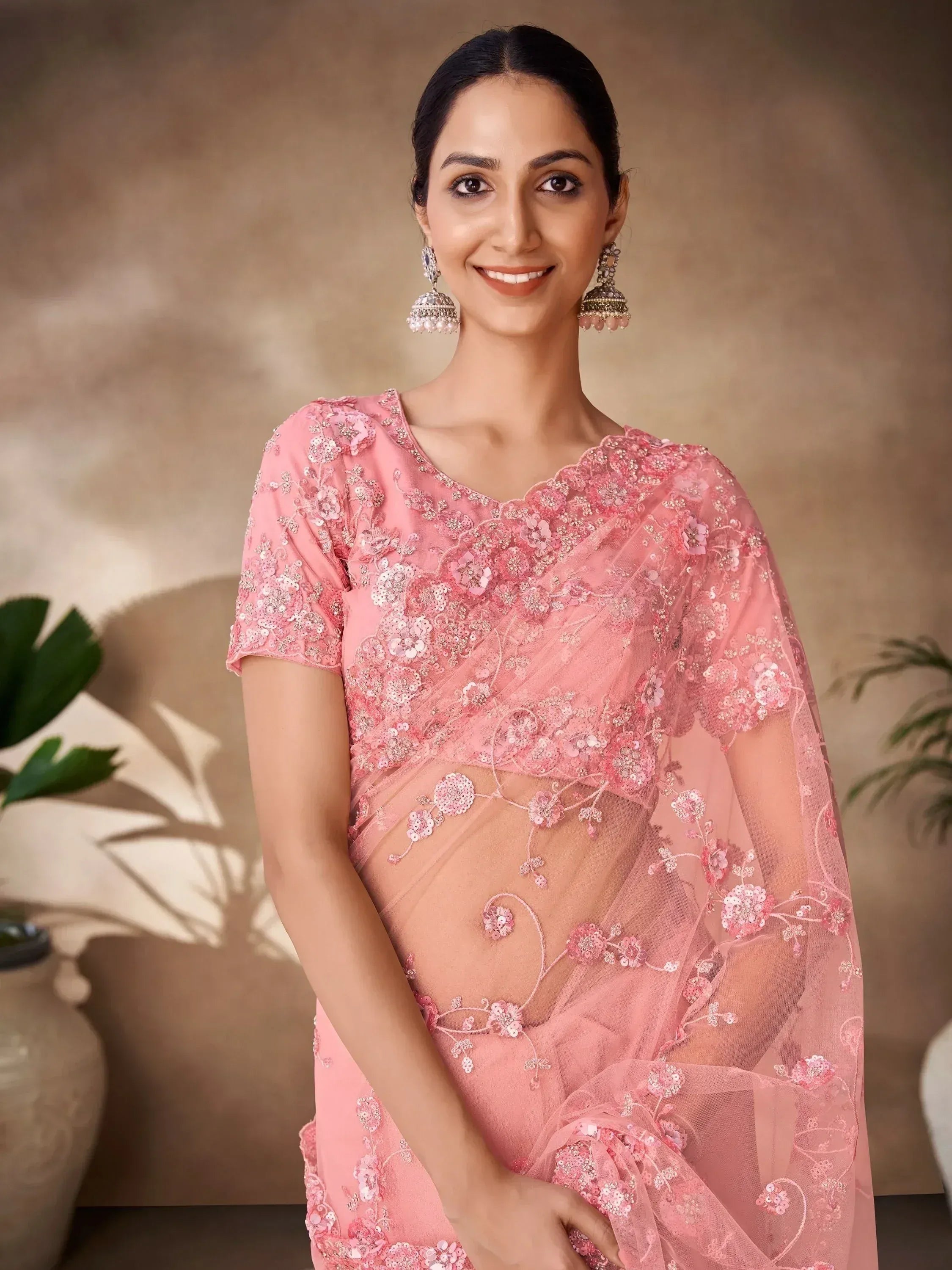 Pink embroidered saree with floral sequin work, perfect for Indian ethnic occasions