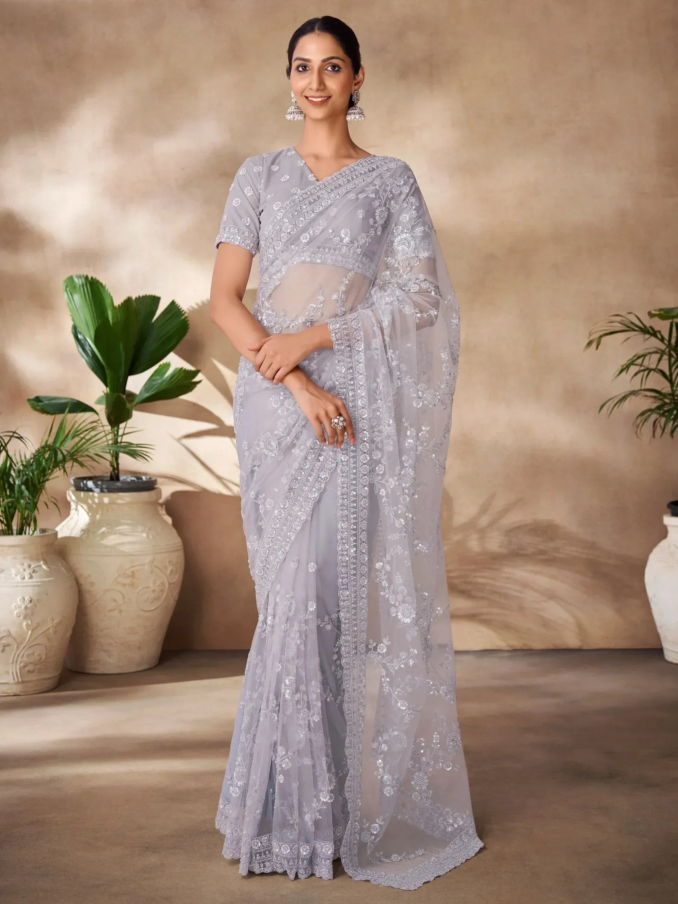 Elegant grey embroidered saree with floral lace, perfect for Indian ethnic wear occasions