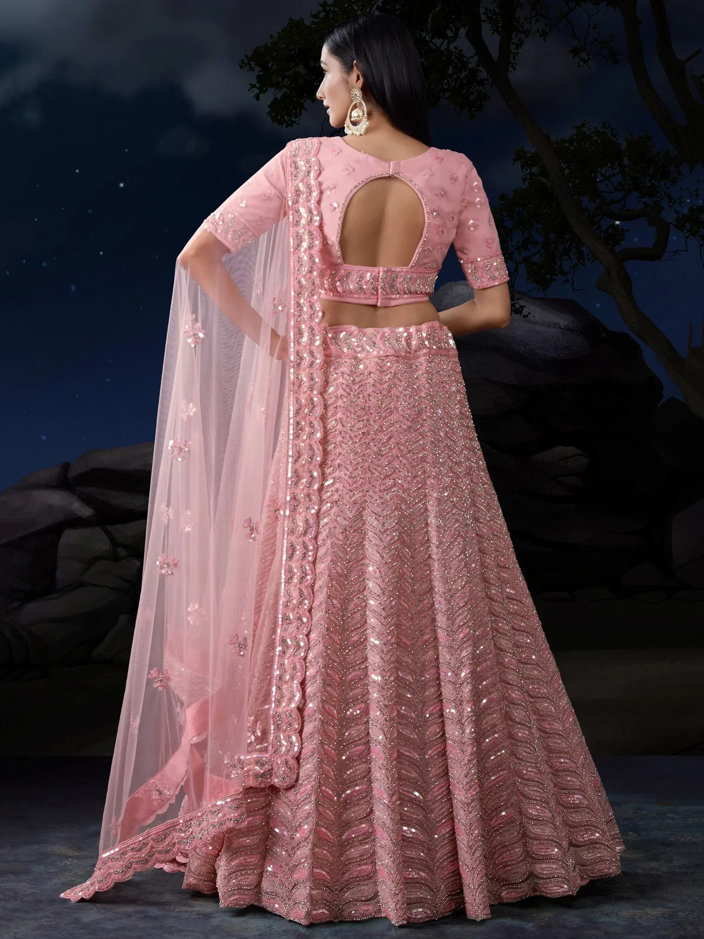 Pink sequined lehenga choli with back cutout and floral dupatta, ethnic Indian wear for weddings