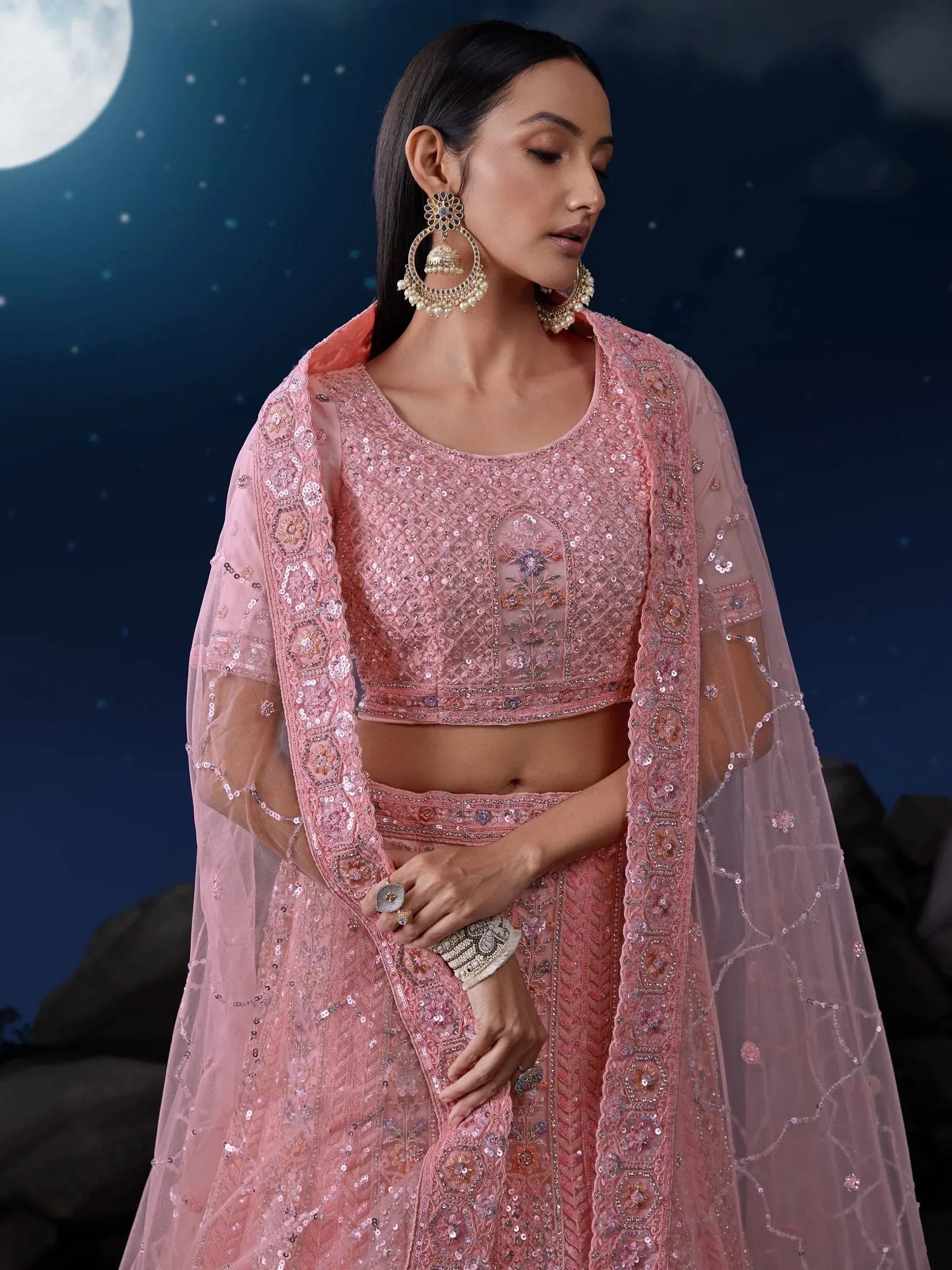 Pink embroidered lehenga choli with sheer dupatta, perfect for Indian ethnic wear and festive occasions