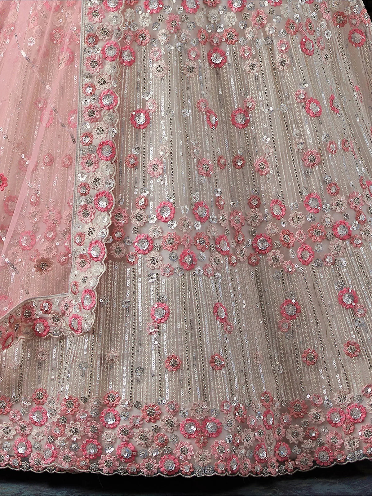 Pink floral embroidered lehenga with sequin detailing and sheer overlay, perfect for Indian ethnic wear