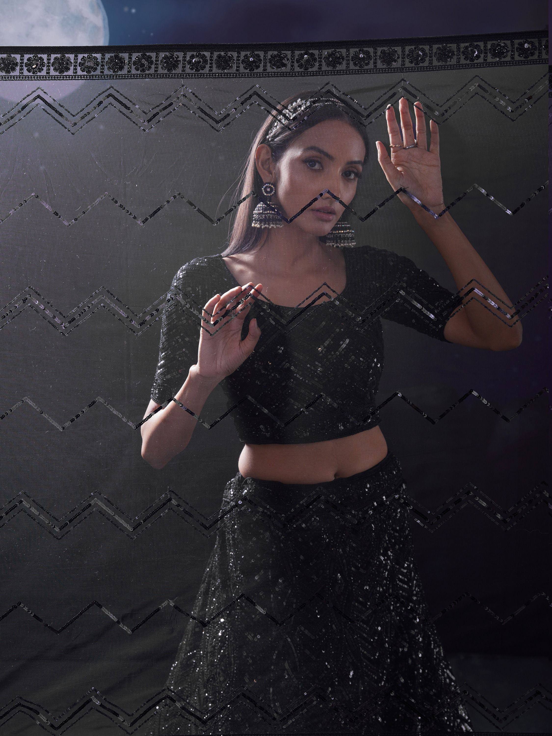 Black sequin lehenga choli with zigzag embroidery, perfect for Indian ethnic wear events