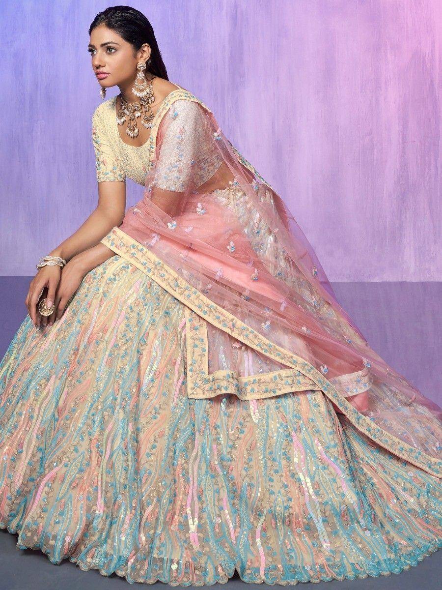 Pastel embroidered lehenga choli with sheer dupatta, perfect for Indian weddings and festive occasions