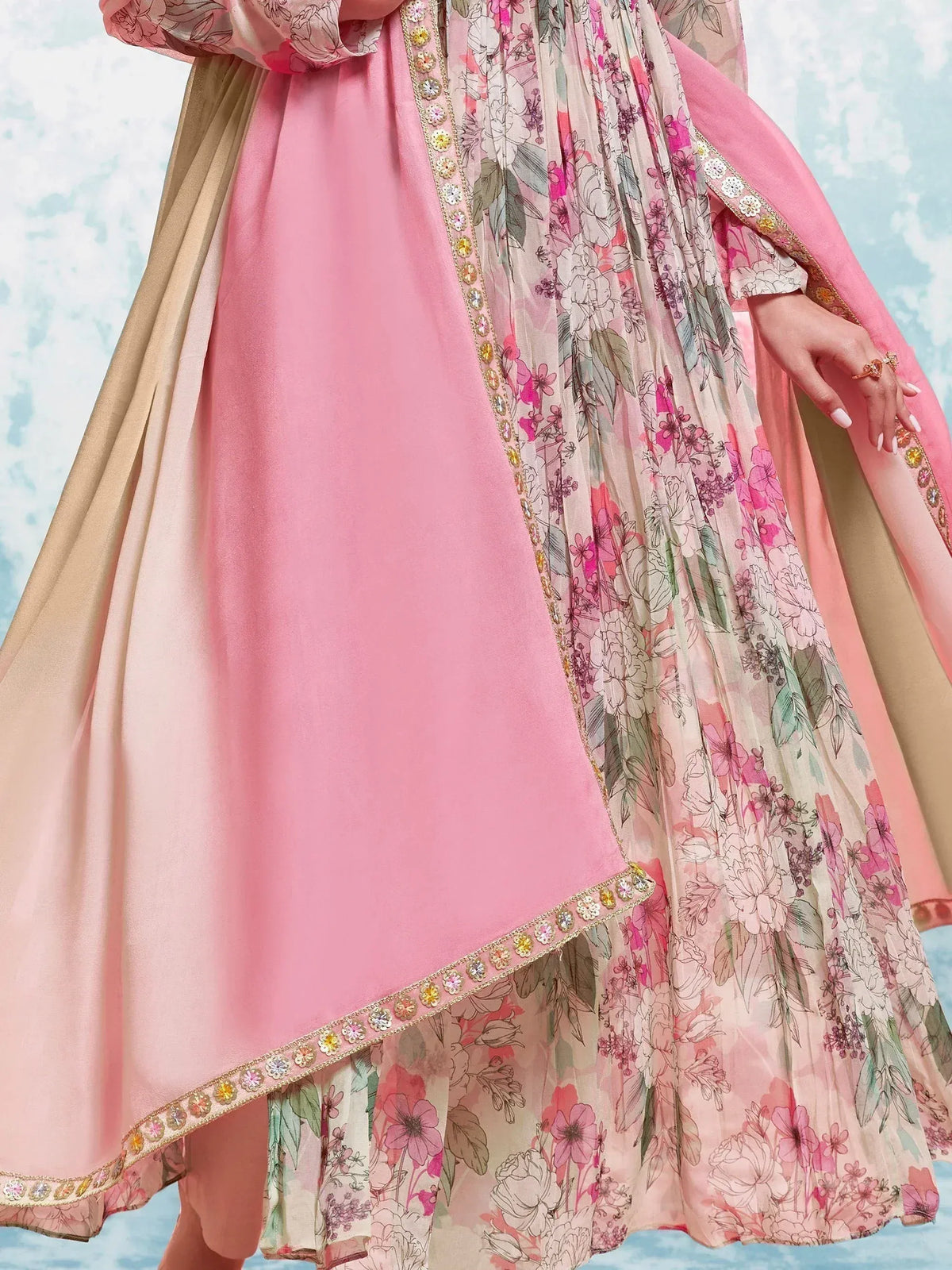 Pink floral printed Indian ethnic gown with embroidered border, perfect for festive occasions