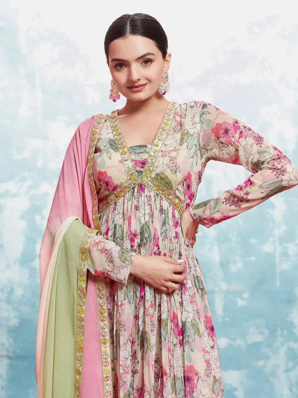 Floral printed ethnic gown with pink dupatta and embellished neckline