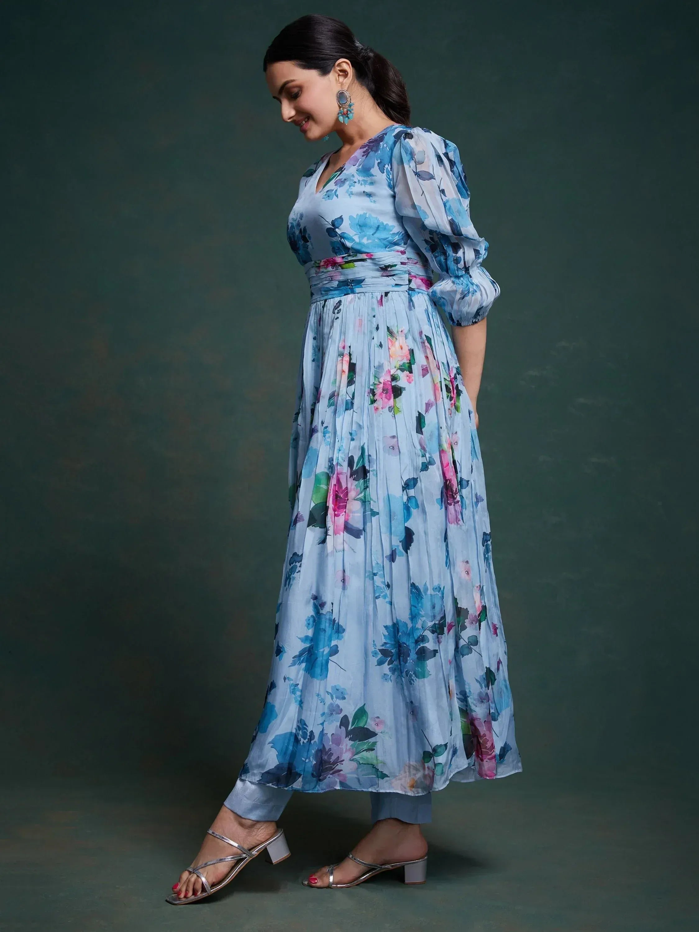 Blue floral ethnic gown with puff sleeves and pleated skirt, perfect for Indian occasions