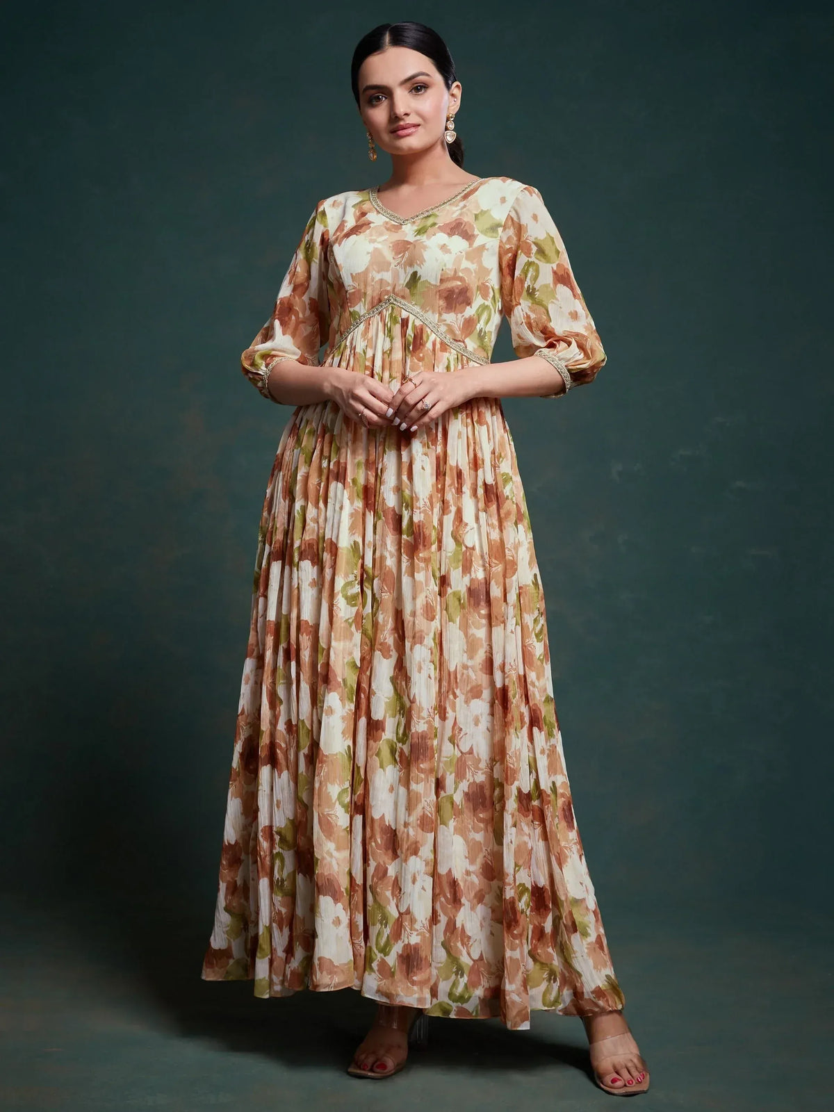 Floral print ethnic gown with pleated skirt and embellished neckline for women