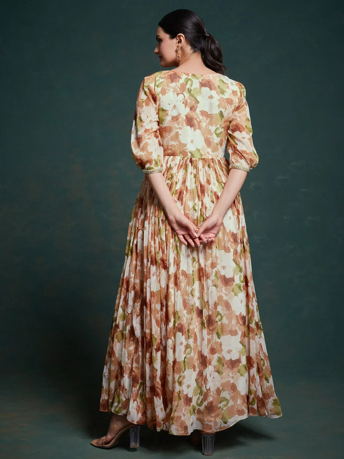 Floral print ethnic gown with pleated skirt and puff sleeves, perfect for Indian occasions
