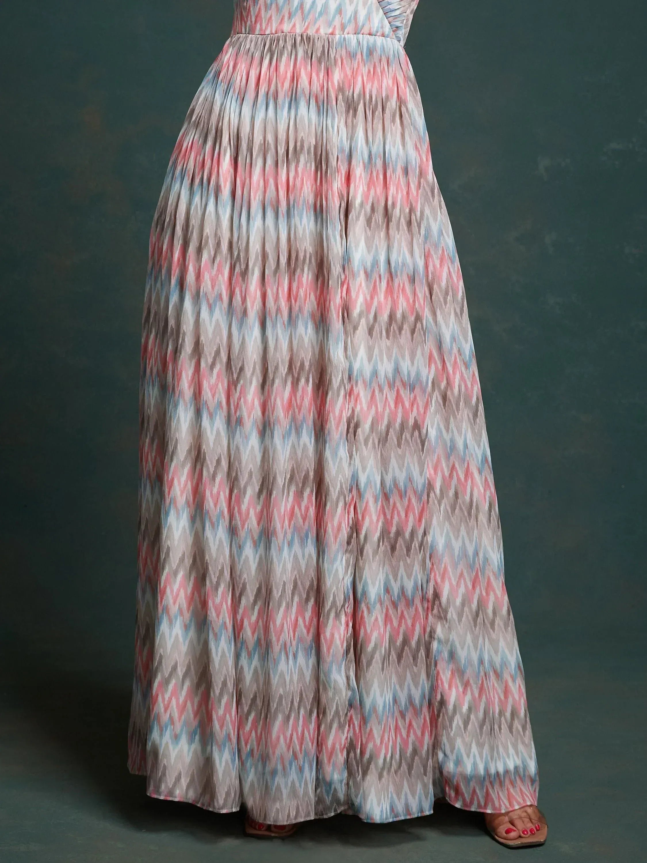 Pleated ethnic gown with pink, blue and grey zigzag pattern, floor length skirt