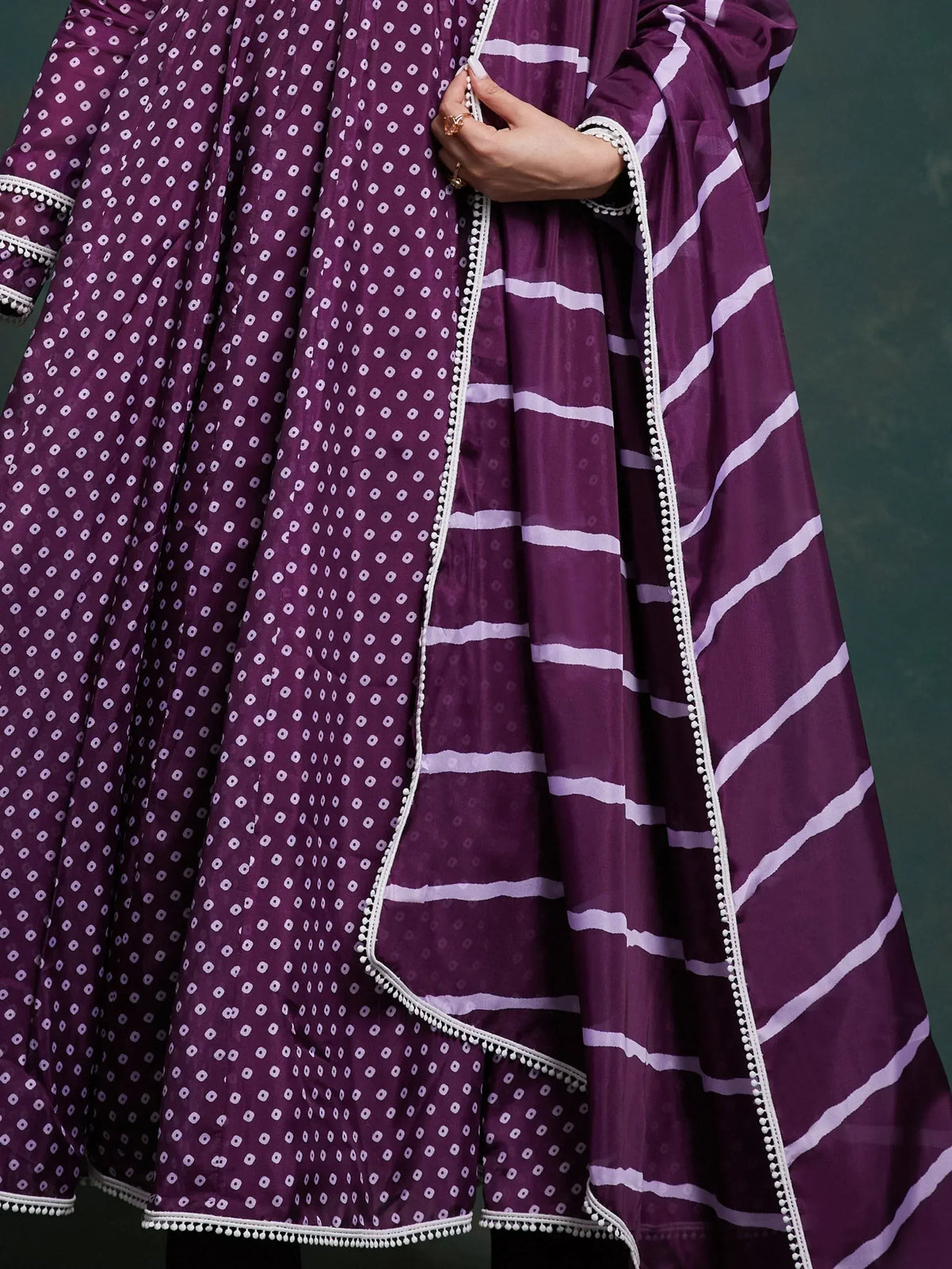 Purple ethnic anarkali with white dot and stripe print, pom-pom trim, and puffed sleeves