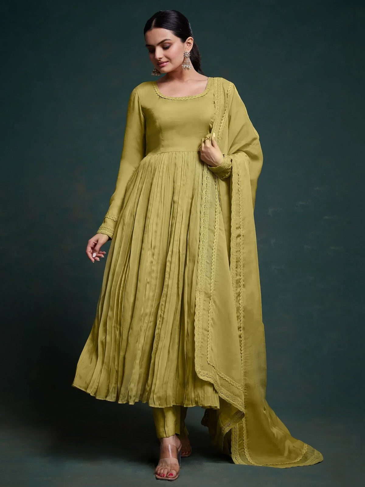 Elegant olive green ethnic anarkali suit with lace detailing and pleated skirt