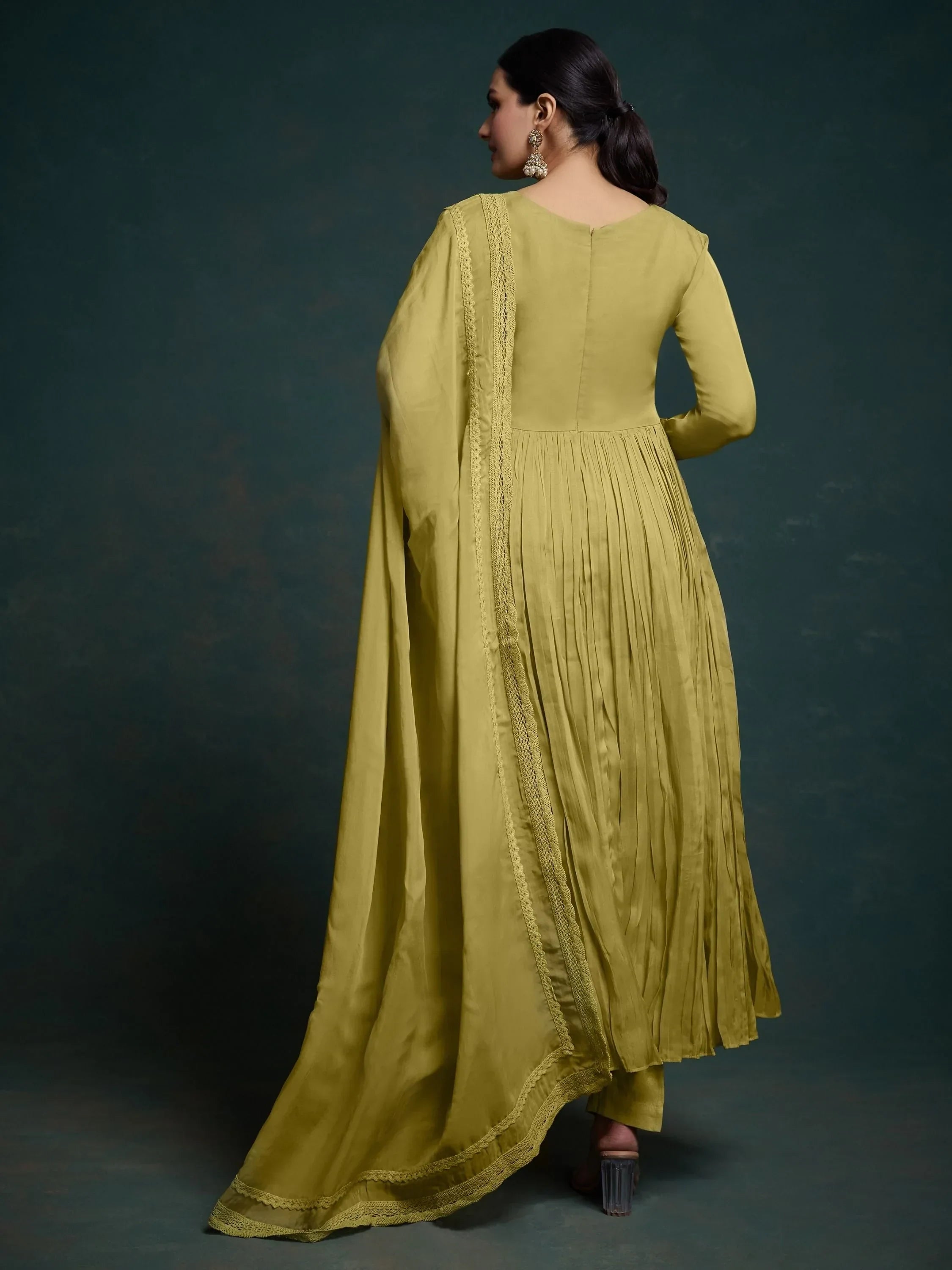 Woman wearing olive green salwar kameez with dupatta, traditional Indian ethnic wear