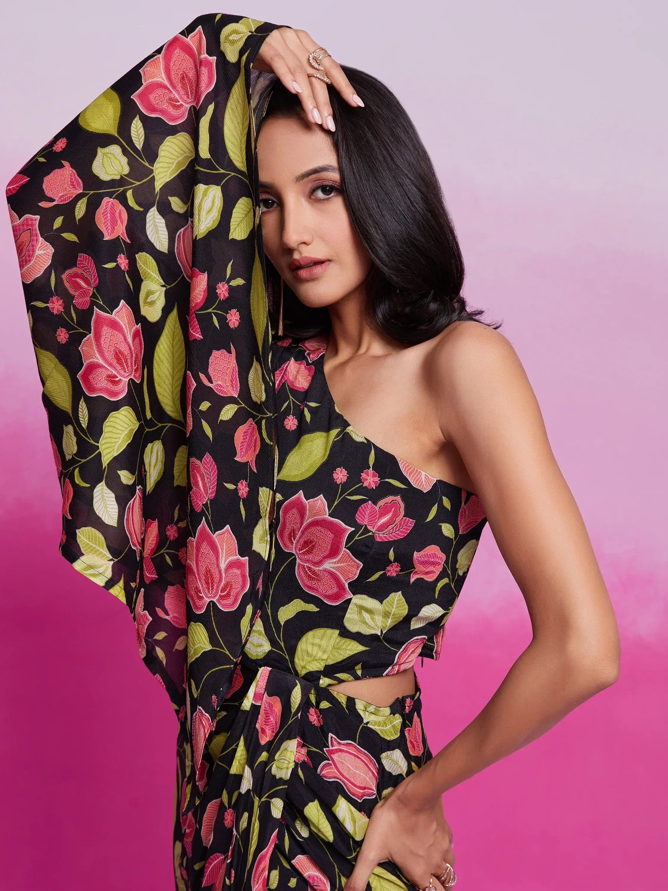 Black floral print ethnic gown with one-shoulder design, perfect for Indian occasions