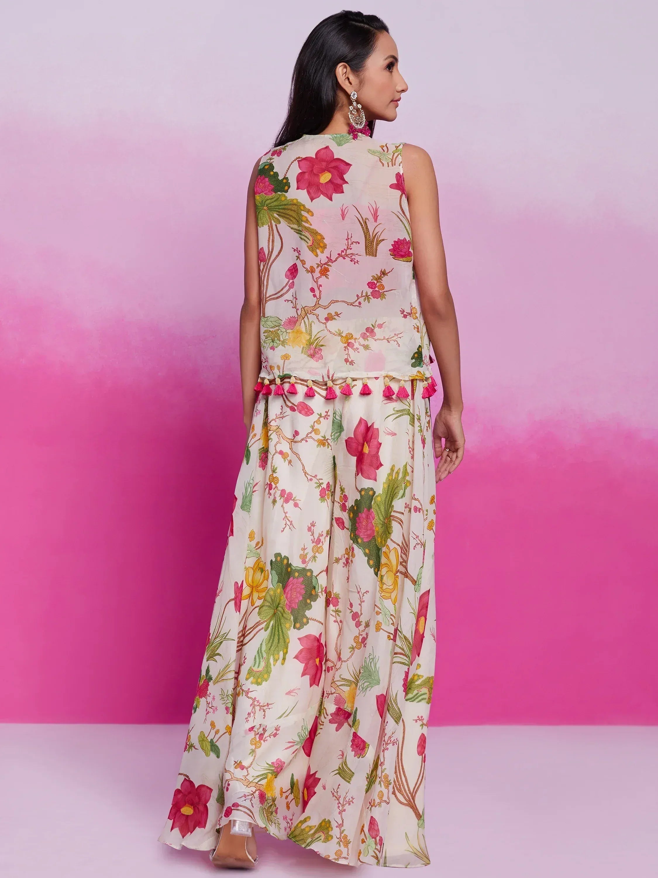 Floral print ethnic gown with tassel trim, perfect for Indian occasions