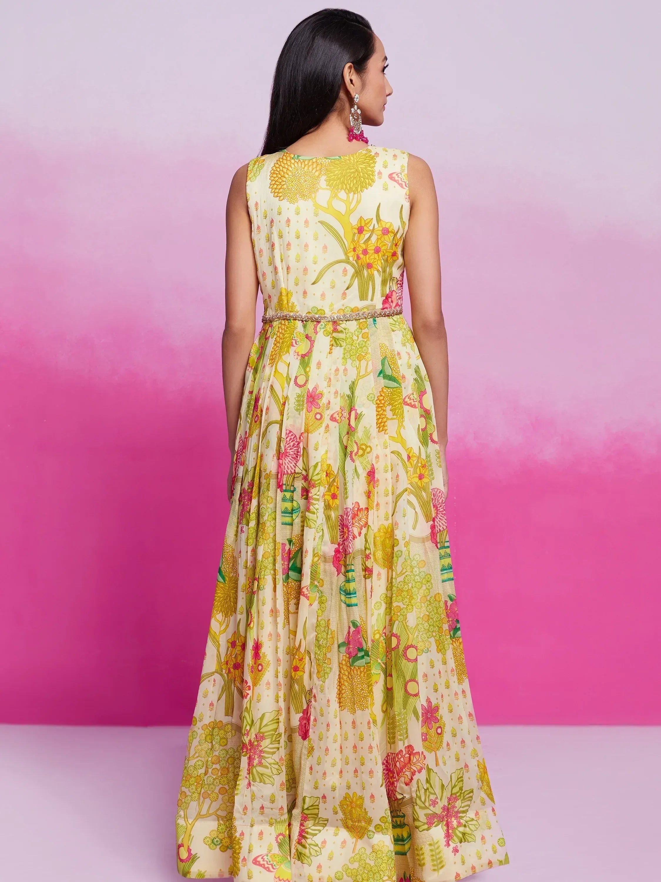 Floral print ethnic gown with waist belt, back view, vibrant yellow pink green design