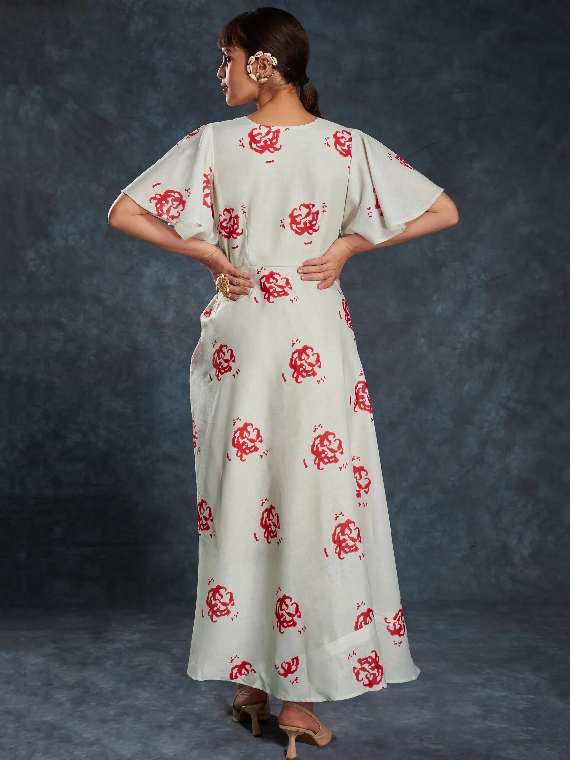 White ethnic gown with red floral print, flared sleeves, and A-line skirt for women