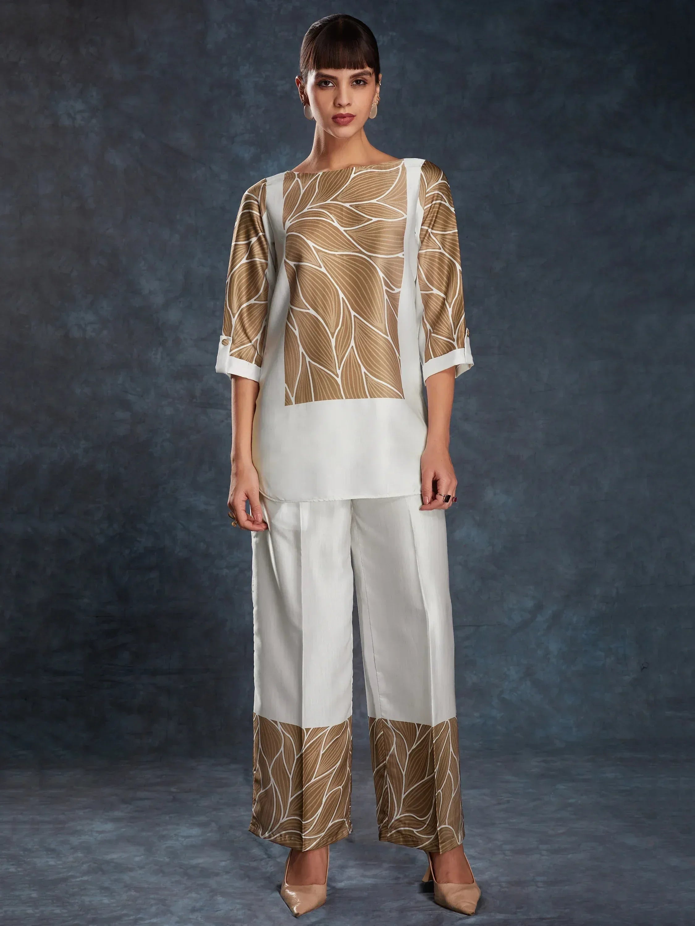 Stylish ethnic salwar kameez with leaf print top and matching palazzo pants, perfect for Indian occasions.
