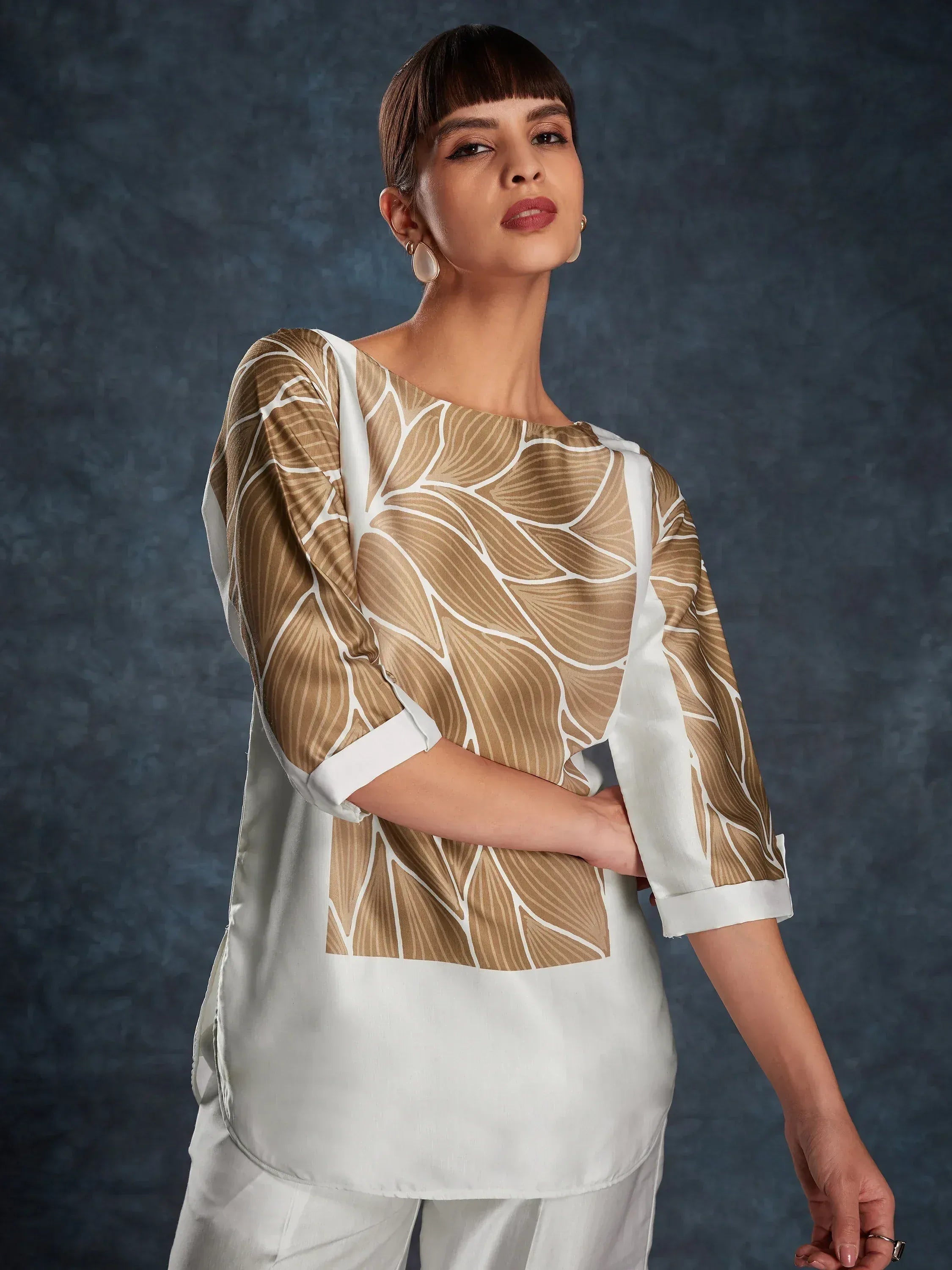 Stylish ethnic kurti with beige leaf print and white sleeves, perfect for modern Indian wear