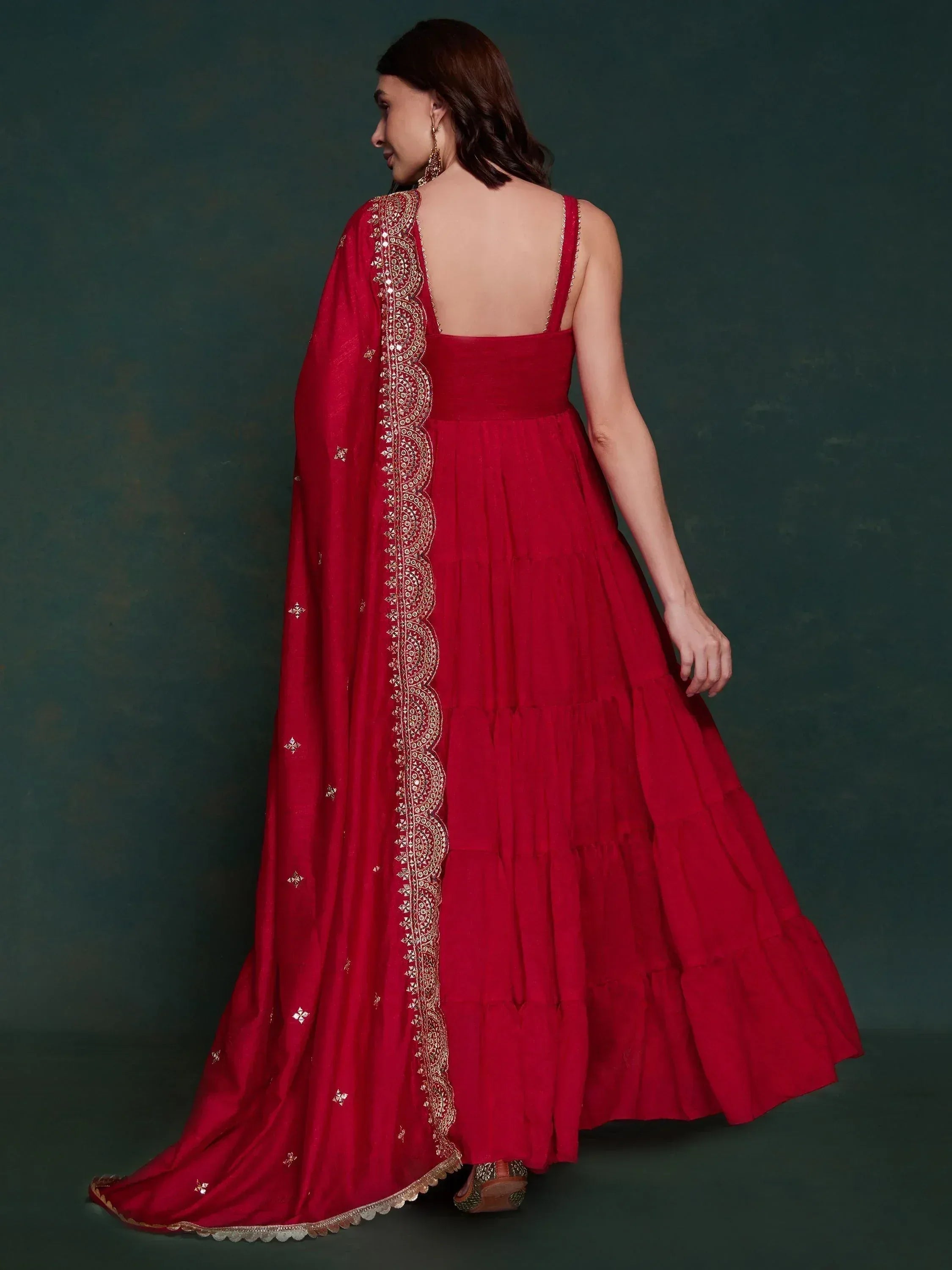 Red ethnic gown with gold embroidery and dupatta, back view