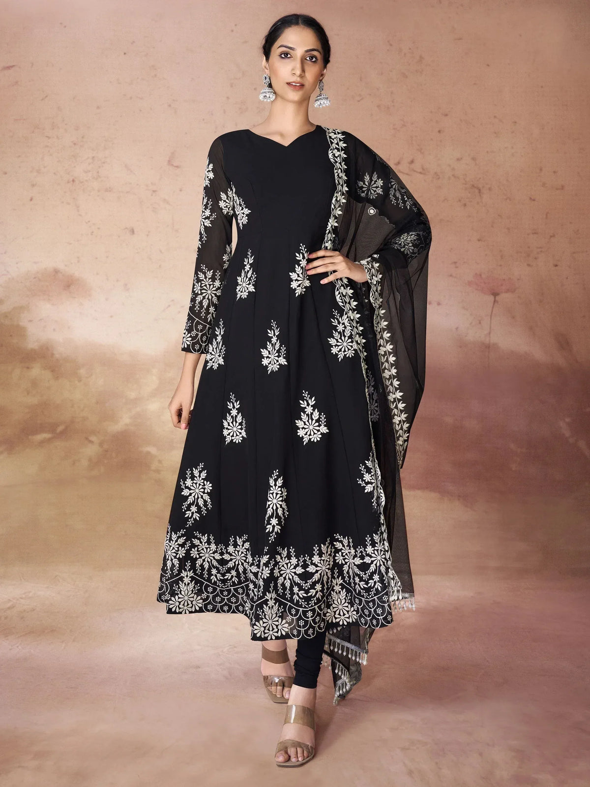 Black embroidered Anarkali suit with white floral print and sheer dupatta, ethnic Indian wear