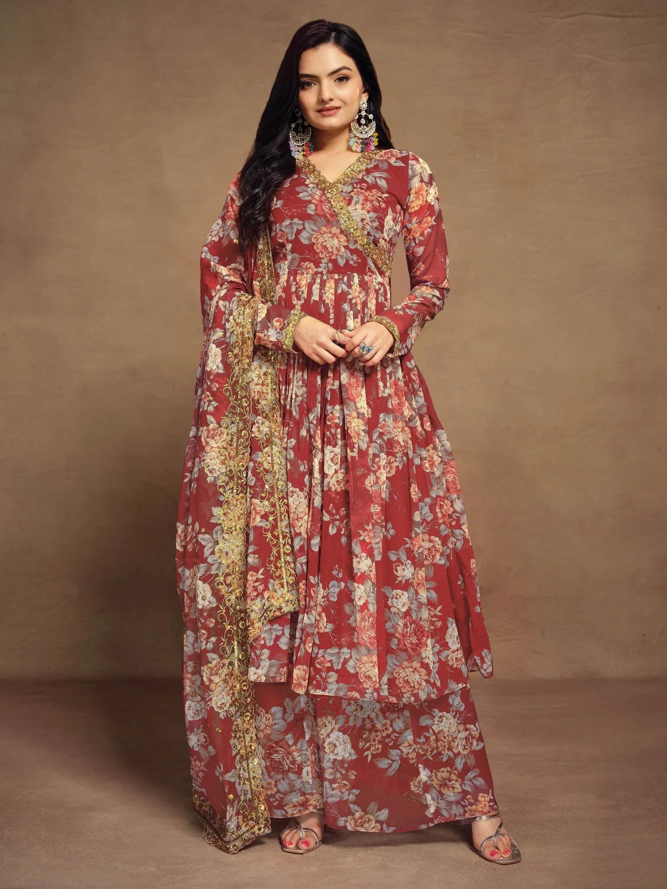 Red floral printed ethnic anarkali suit with gold embroidery and dupatta, perfect for Indian occasions