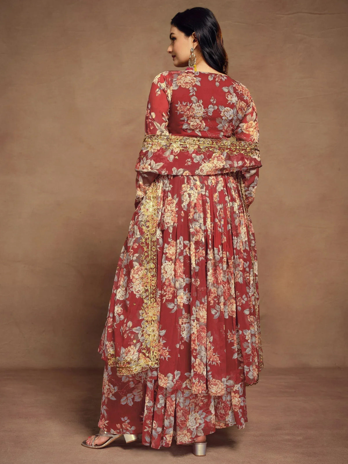 Red floral printed ethnic gown with gold embroidery, perfect for Indian occasions and parties