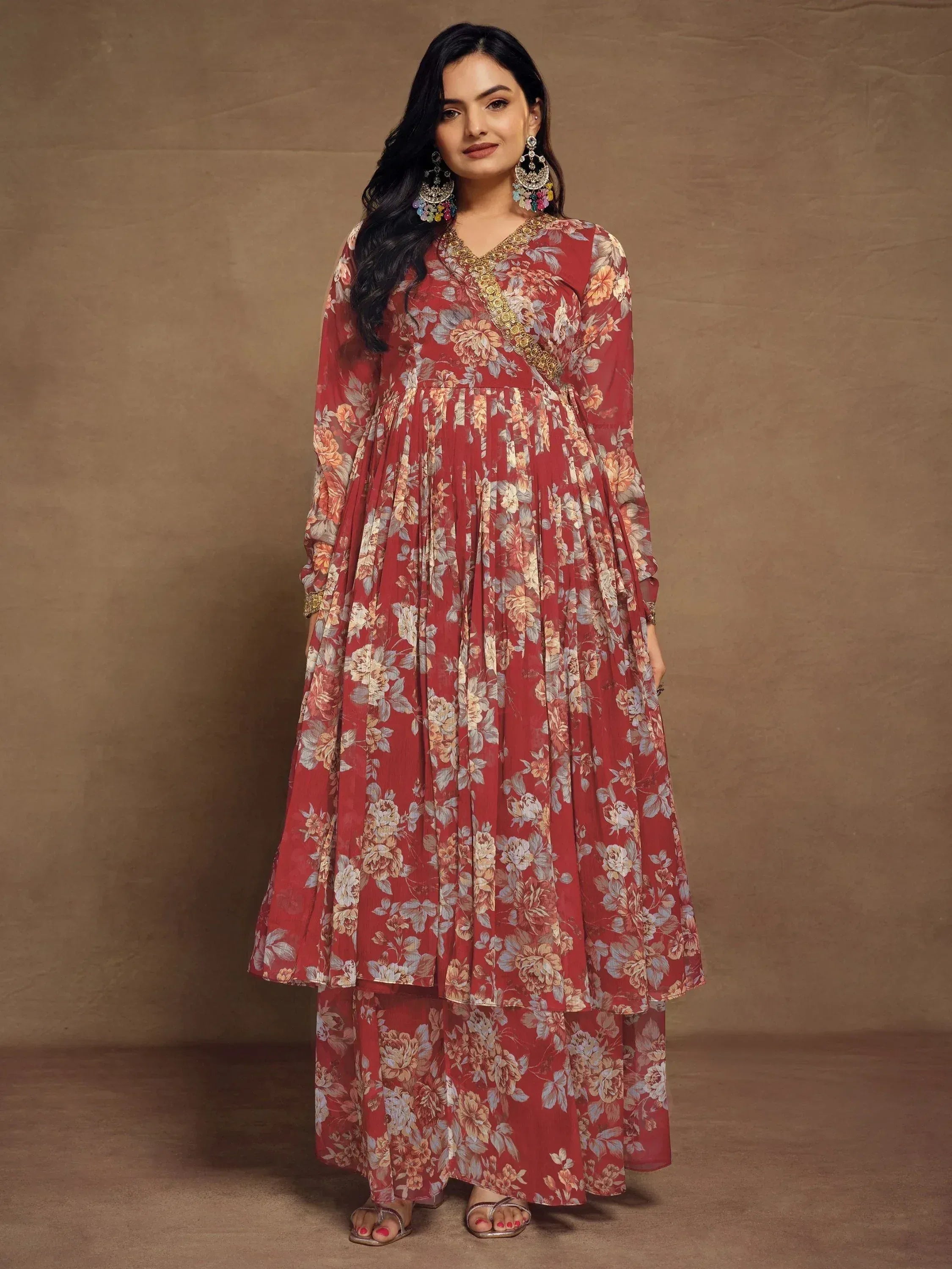 Red floral print ethnic gown with gold embroidery, perfect for Indian occasions and festive wear.