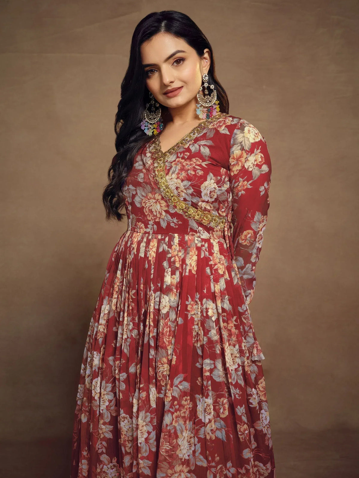 Red floral ethnic gown with gold embroidery, perfect for Indian occasions and festive wear.