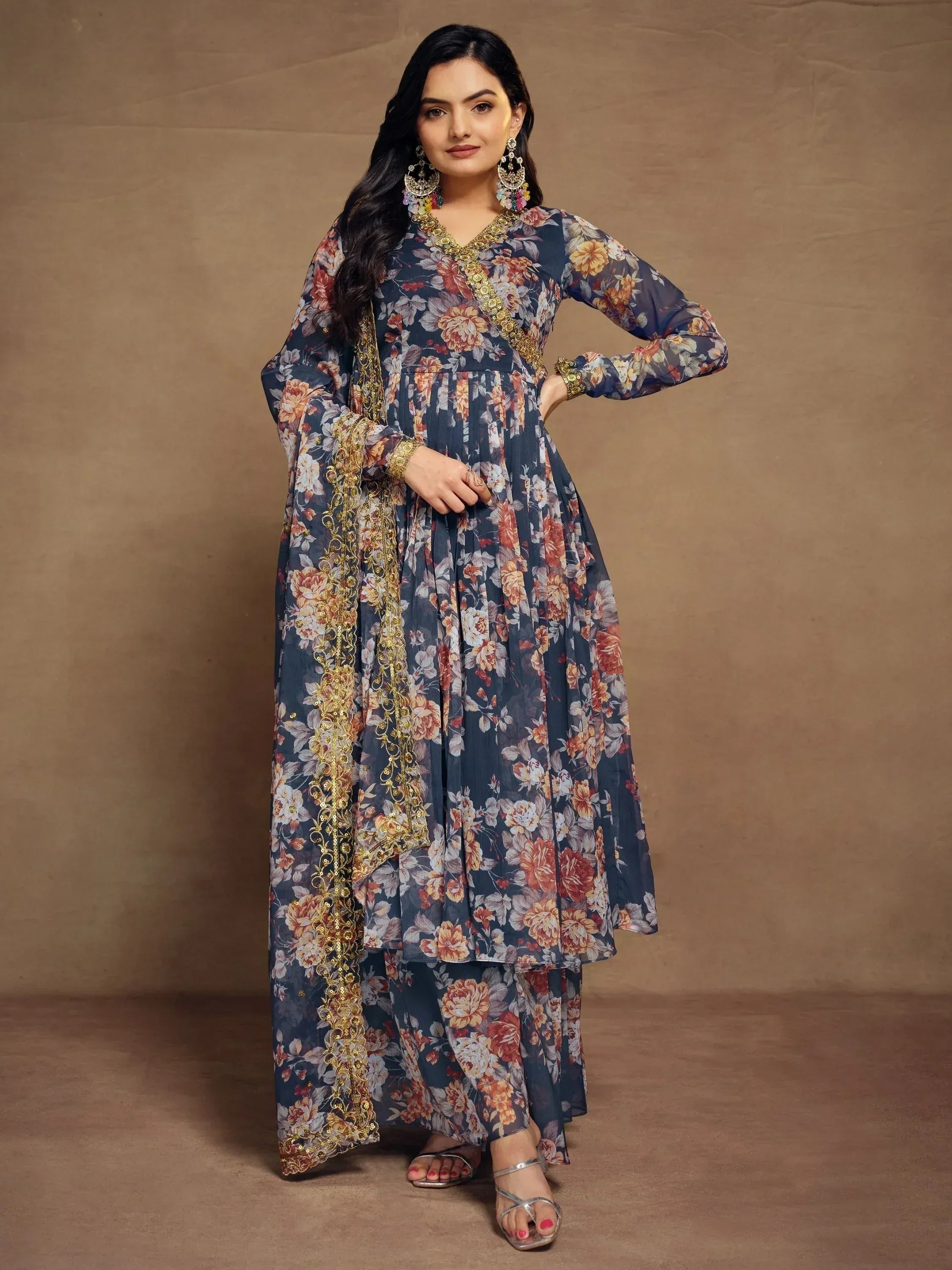 Floral print ethnic gown with gold embroidery, perfect for Indian occasions and festive wear.