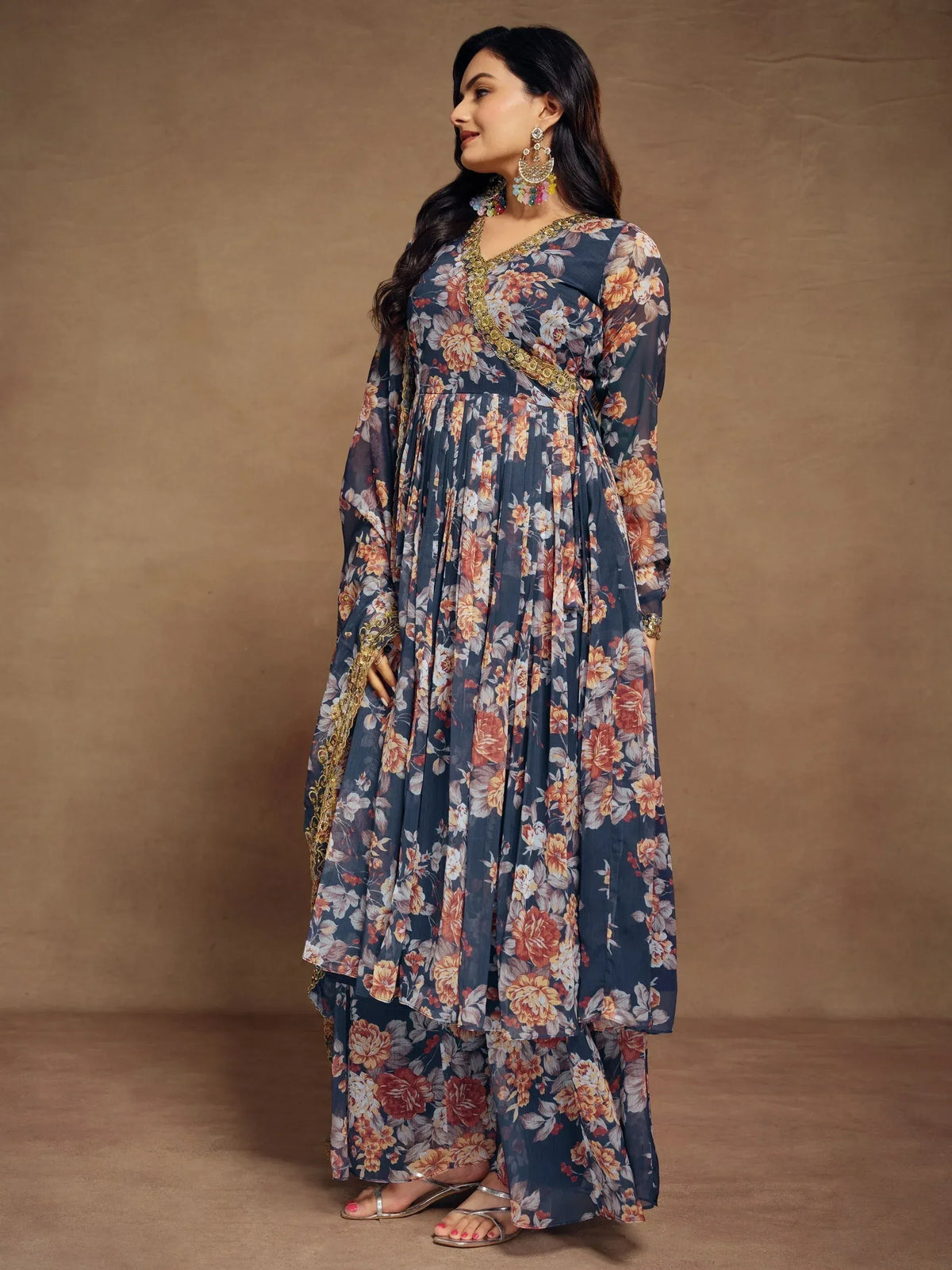 Floral print ethnic gown with gold embroidery, perfect for Indian occasions