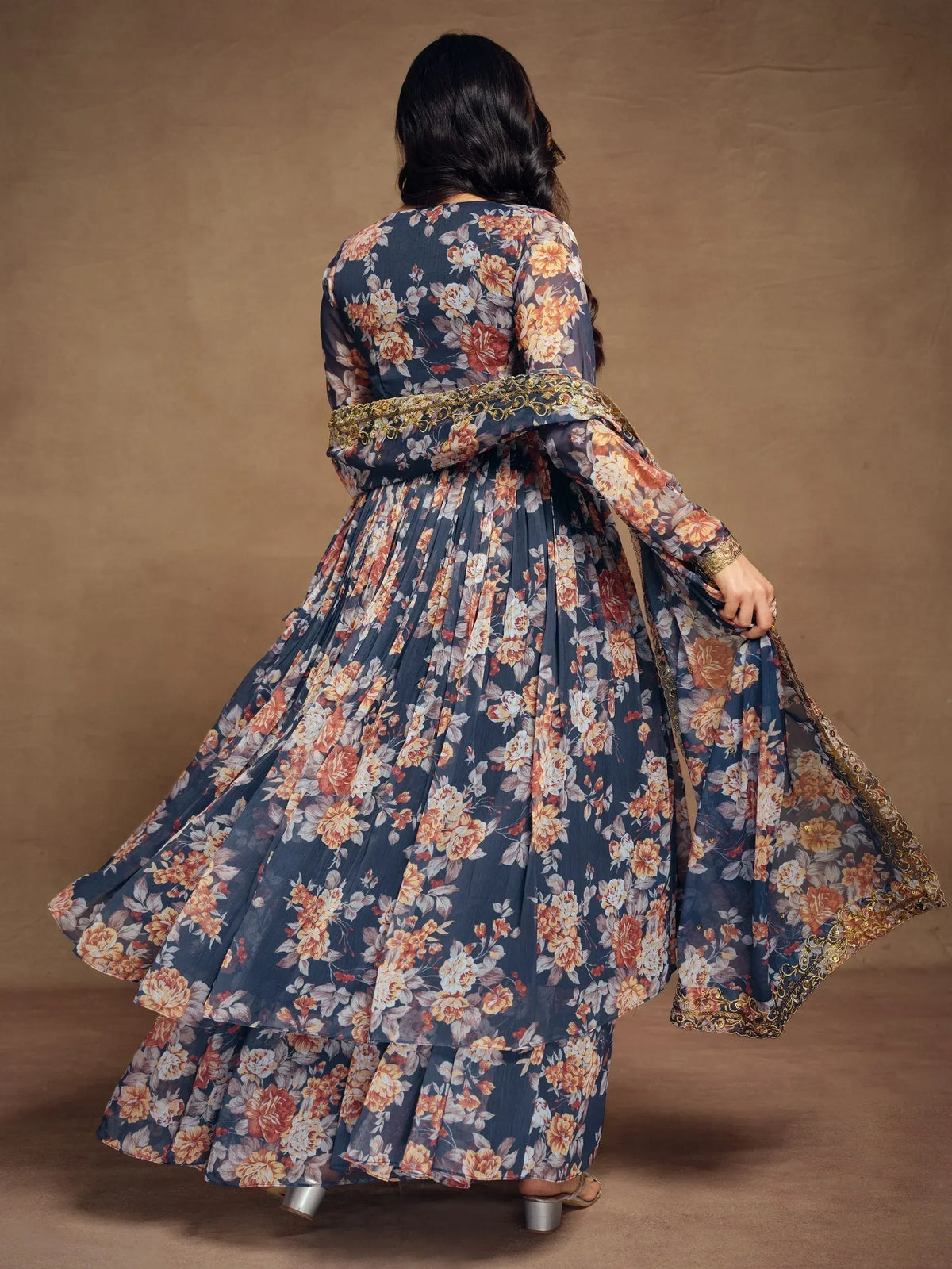 Floral print ethnic gown with gold trim, back view, pleated skirt, Indian designer wear
