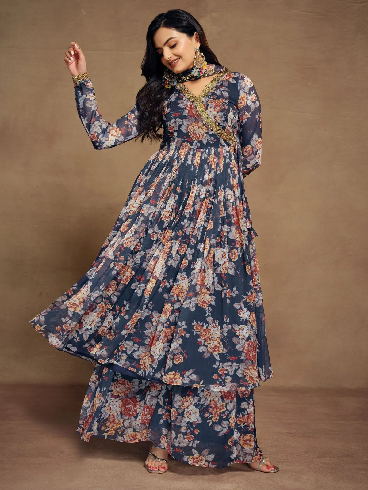 Floral print ethnic gown with gold embroidery, perfect for Indian occasions and festive wear.