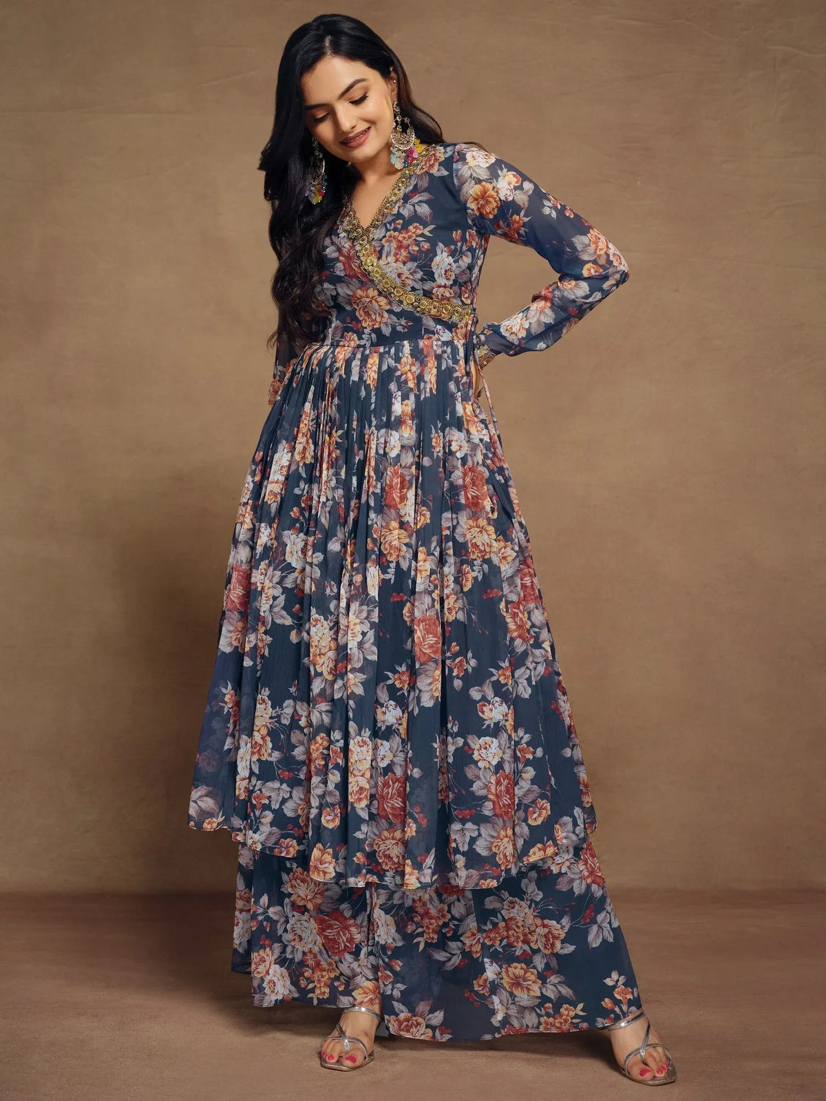 Floral print ethnic gown with gold embroidery, perfect for Indian occasions and festive wear.