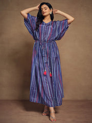 Woman in blue and purple striped ethnic gown with tassel ties, styled for Ethnic Plus