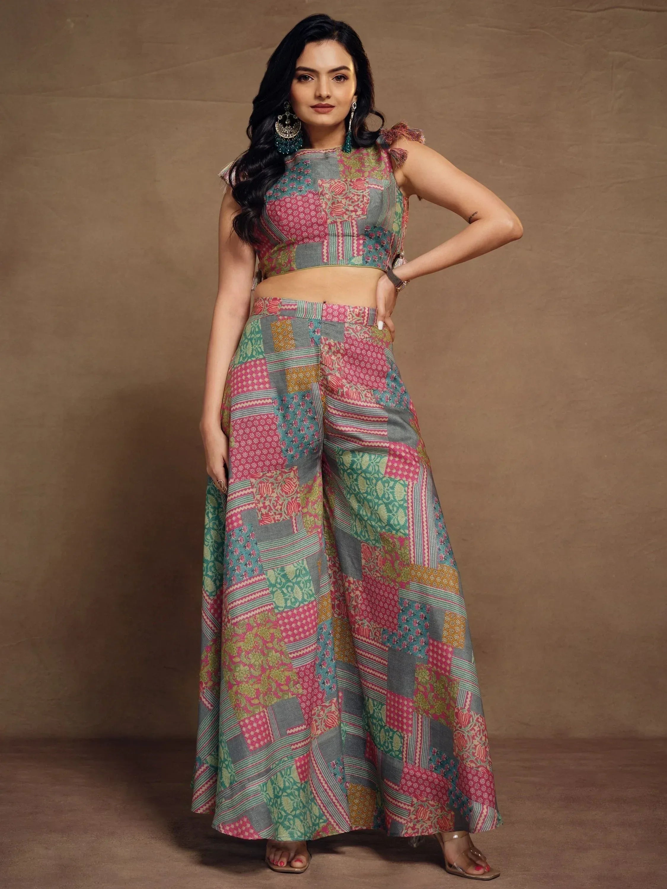 Woman in colorful patchwork ethnic crop top and palazzo pants, Indian designer wear