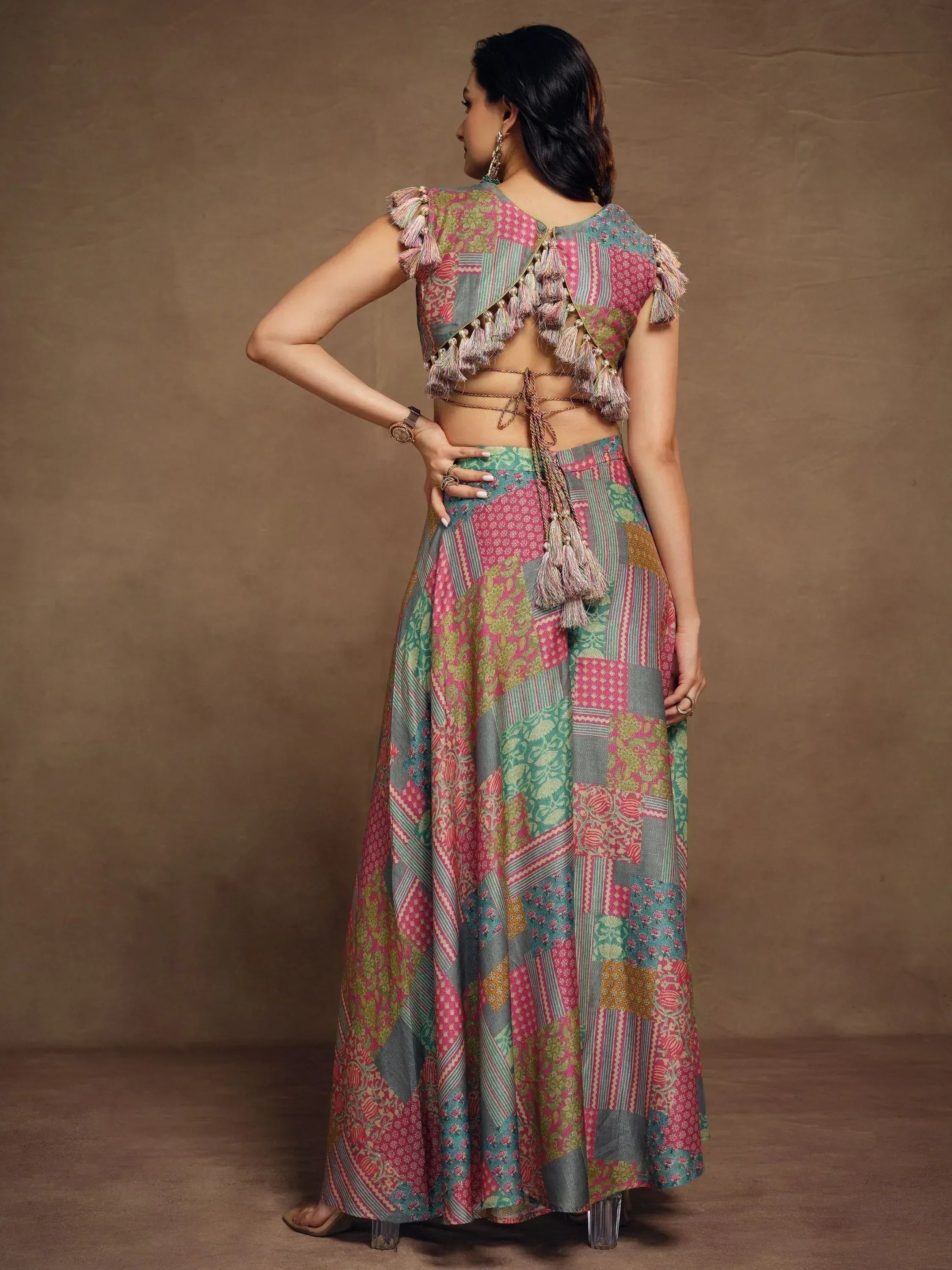 Colorful patchwork lehenga choli with tassel detailing, perfect for ethnic occasions