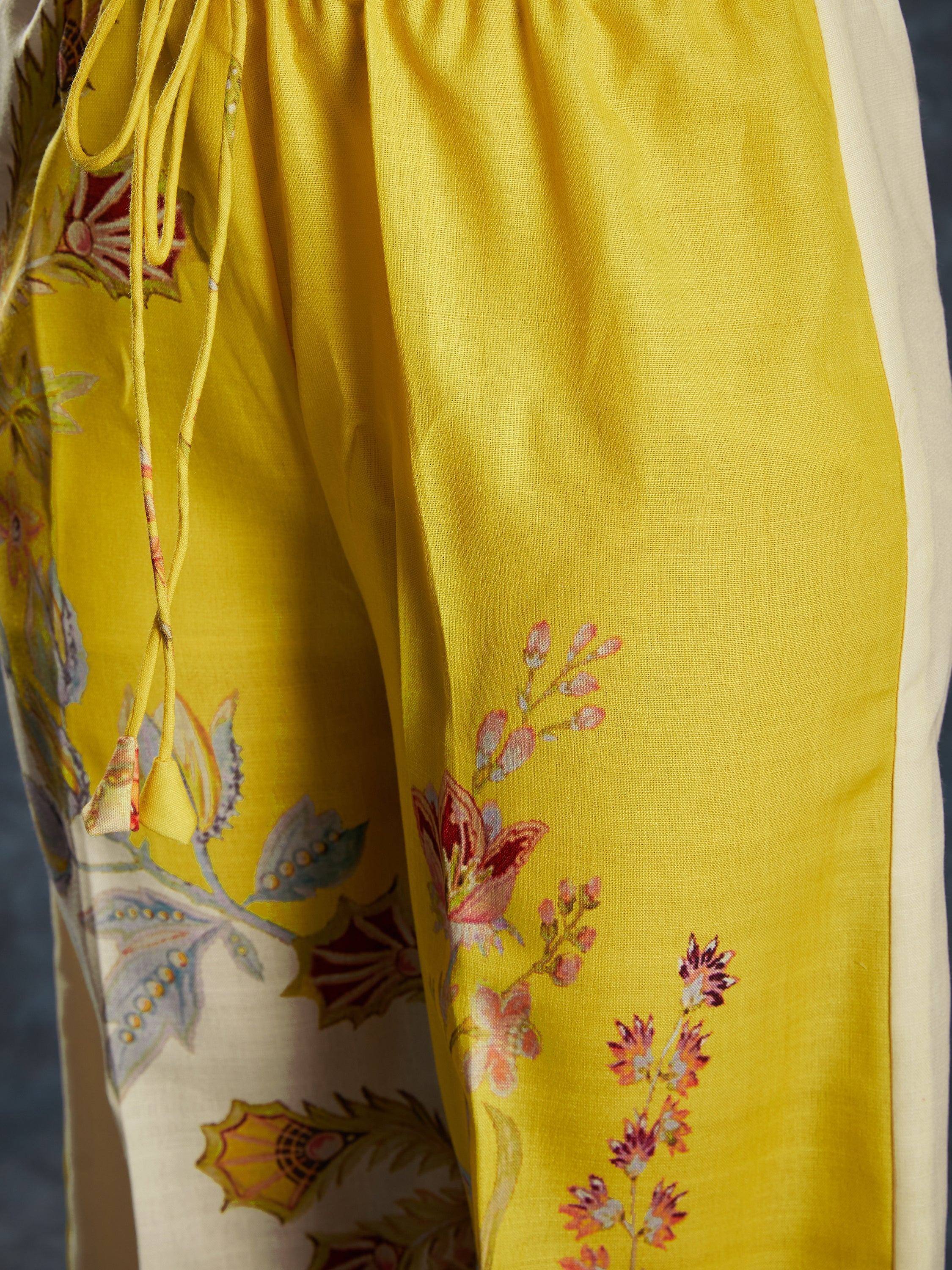 Yellow floral print ethnic palazzo pants with drawstring waist, perfect for Indian wear