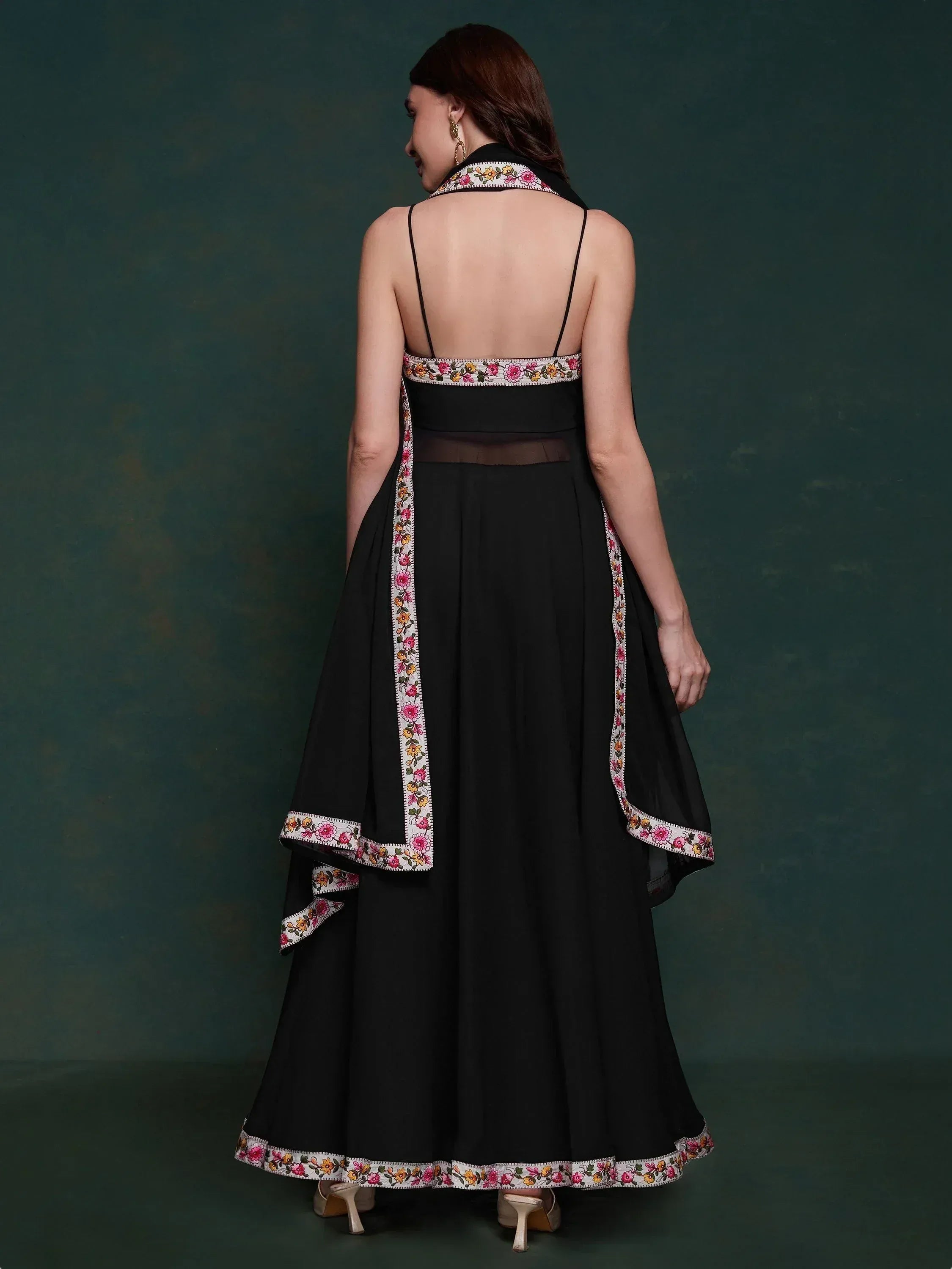 Black ethnic gown with floral embroidery, back view, Indian designer wear