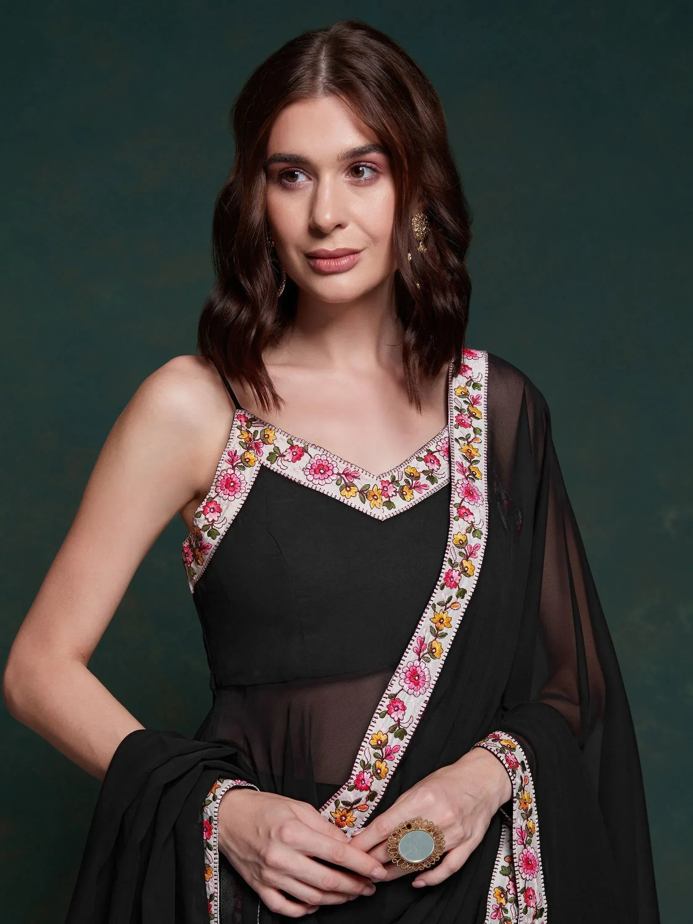 Black ethnic gown with floral embroidery, perfect for Indian occasions and festive wear.