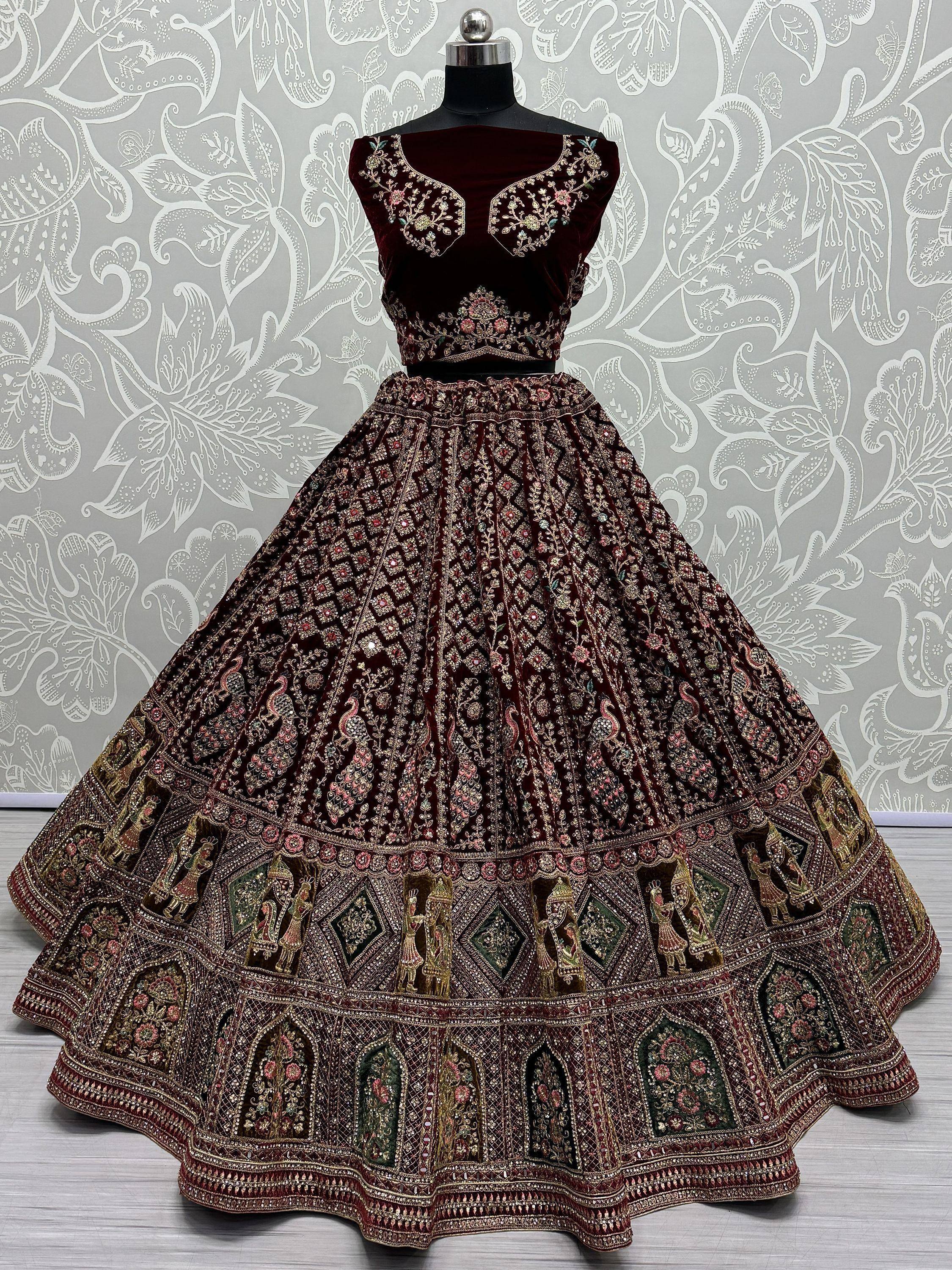 Maroon velvet lehenga choli with heavy floral and peacock embroidery, perfect for Indian weddings and festivals