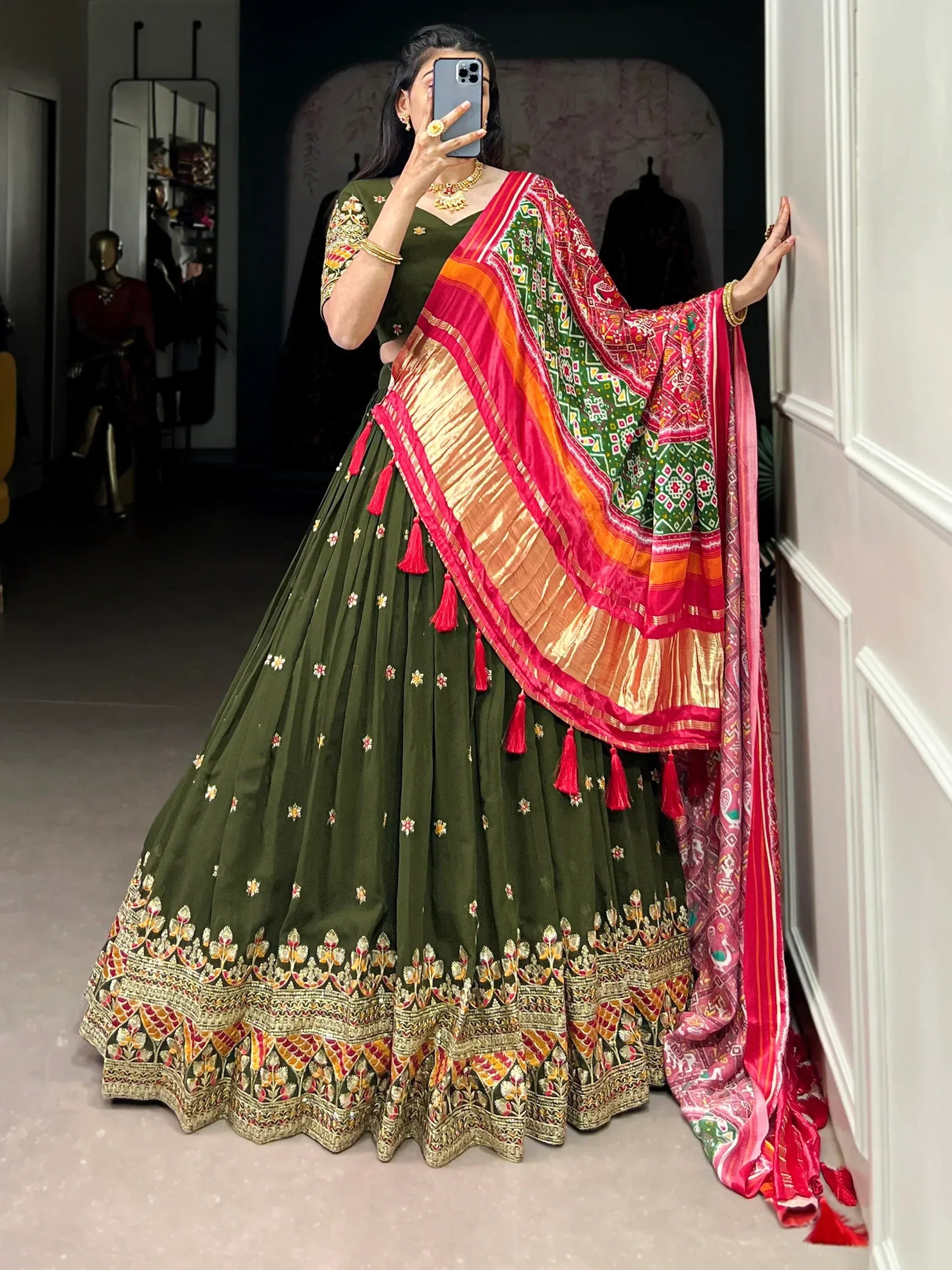 Green embroidered lehenga choli with colorful dupatta, Indian ethnic wear for women